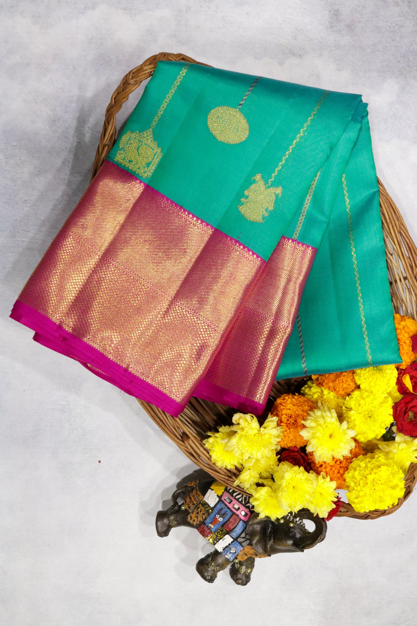 Turquoise Blue Kanchipuram Silk Saree with Zari Stripes, Buttas & Contrast Border