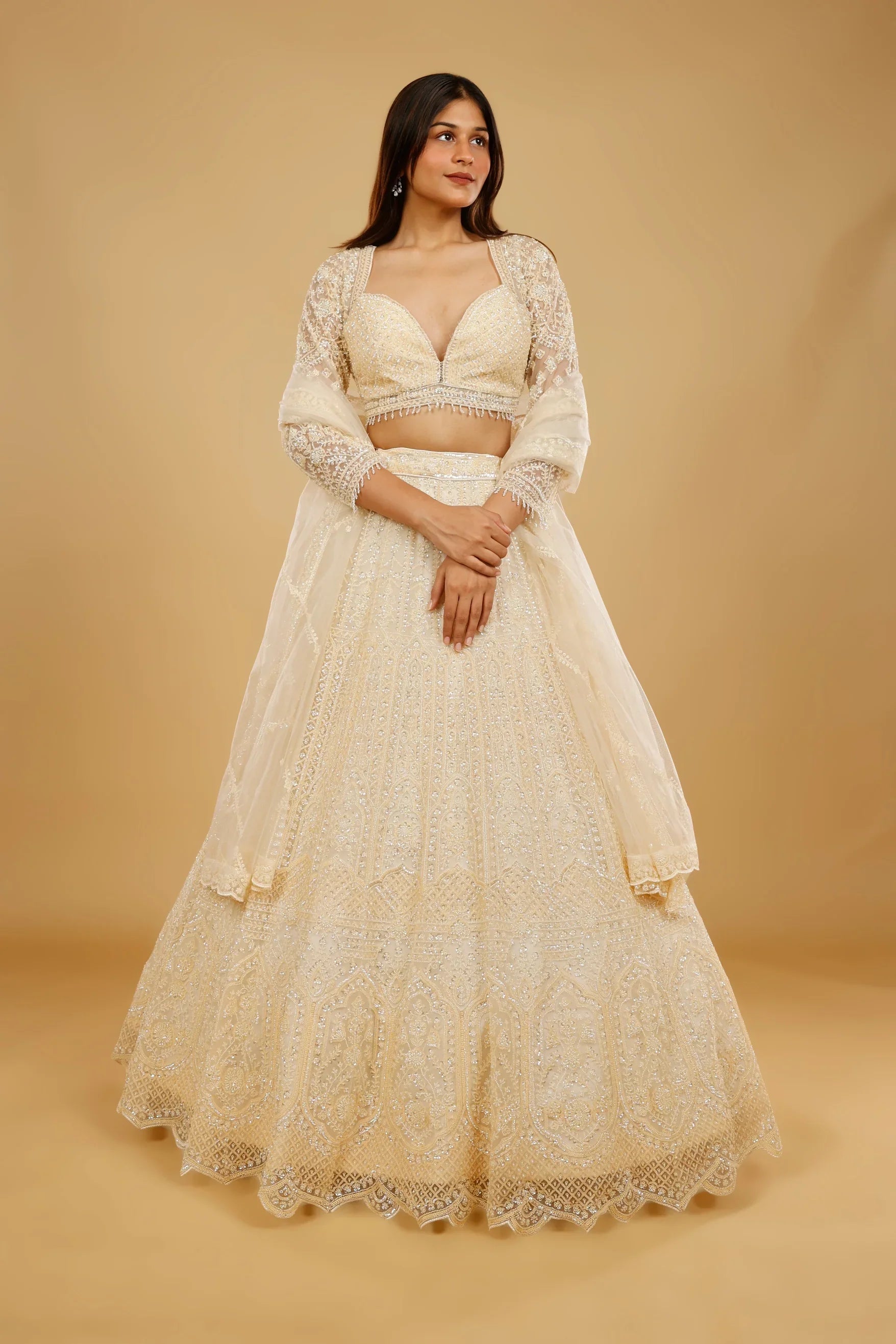 Ivory Gold Net Lehenga Set with Sequin, Cutdana & Pearl Embroidery - Mokshaa