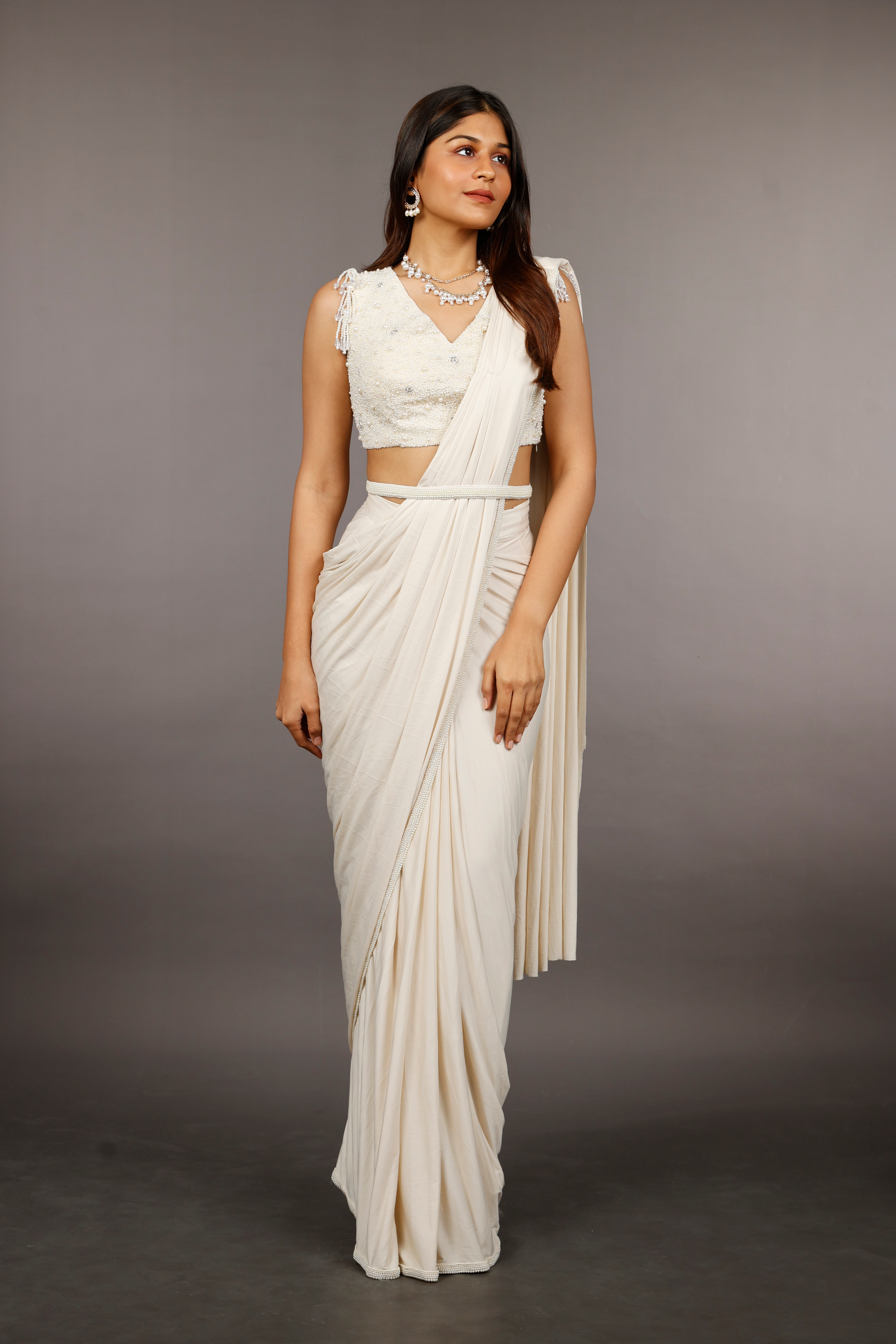 Ivory Lycra Drape Saree with Pearl & Stone Embroidered Blouse