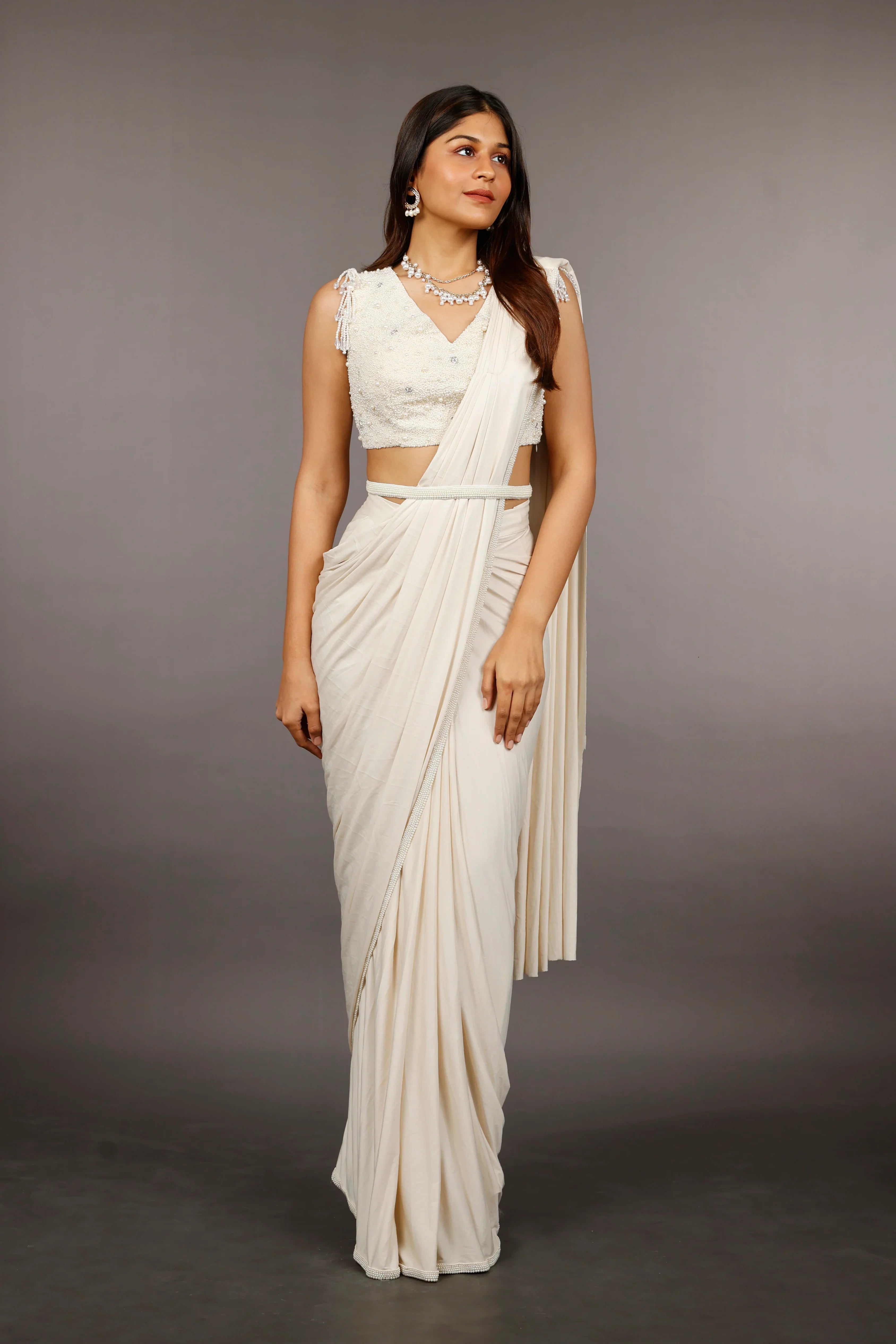 Ivory Lycra Drape Saree with Pearl & Stone Embroidered Blouse | Mokshaa