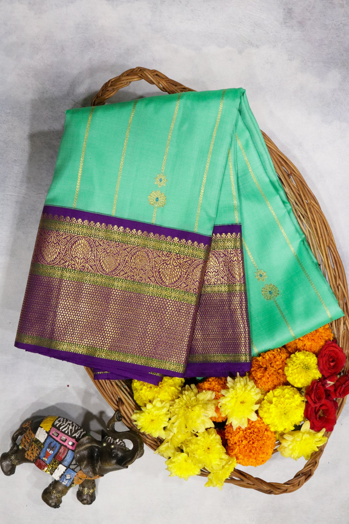 Turquoise Blue Kanchipuram Silk Saree with Zari Stripes, Buttas & Contrast Border