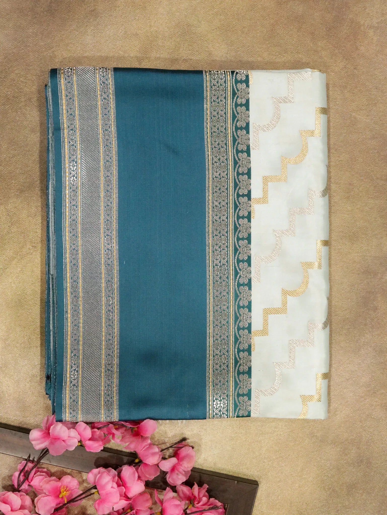 Light Blue Banarasi Silk Saree with Silver–Gold Zig-Zag Weave & Contrast Satin Border | Mokshaa