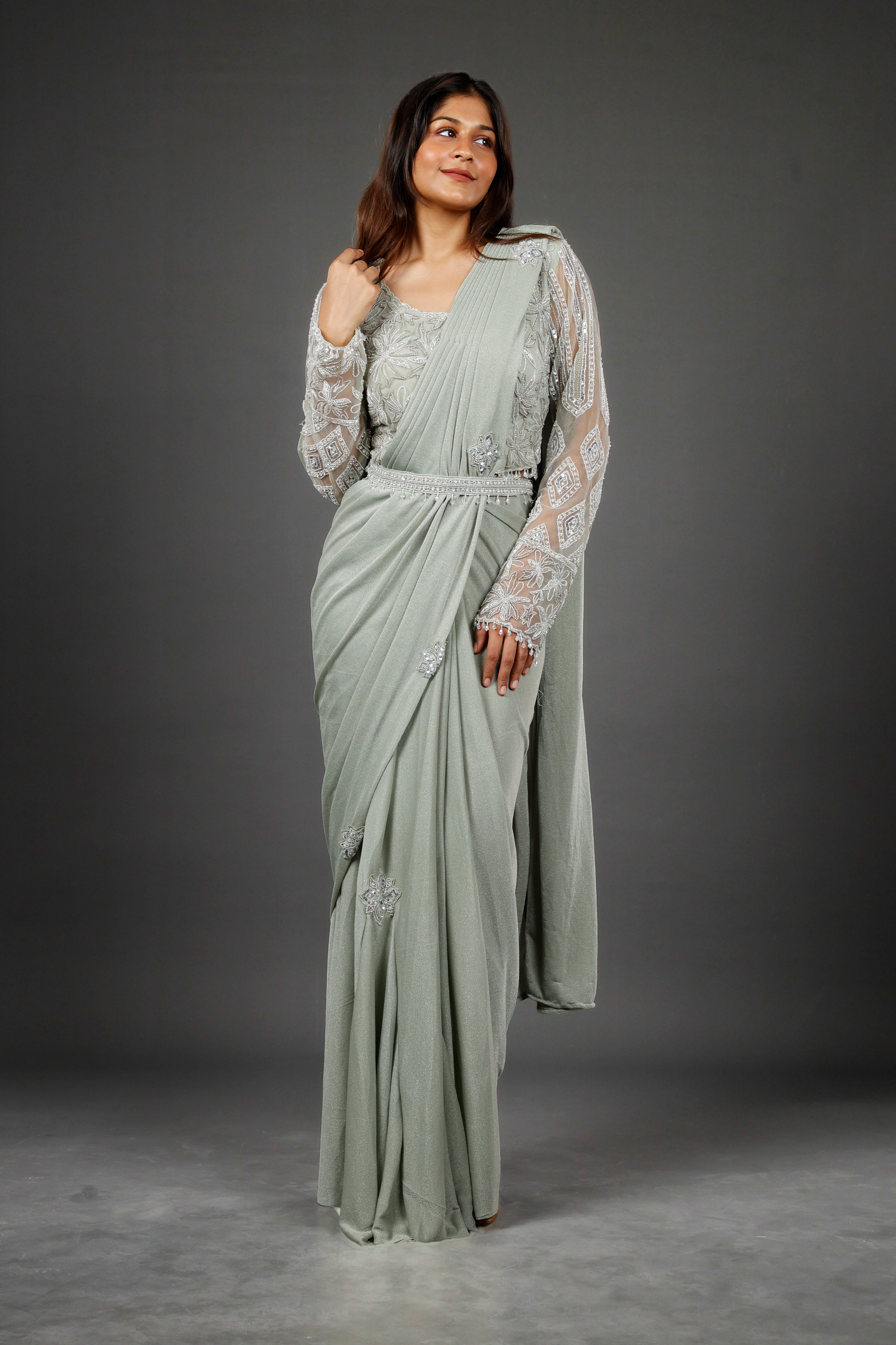 Sage Green Shimmer Drape Saree with Kutdana & Pearl Embroidery