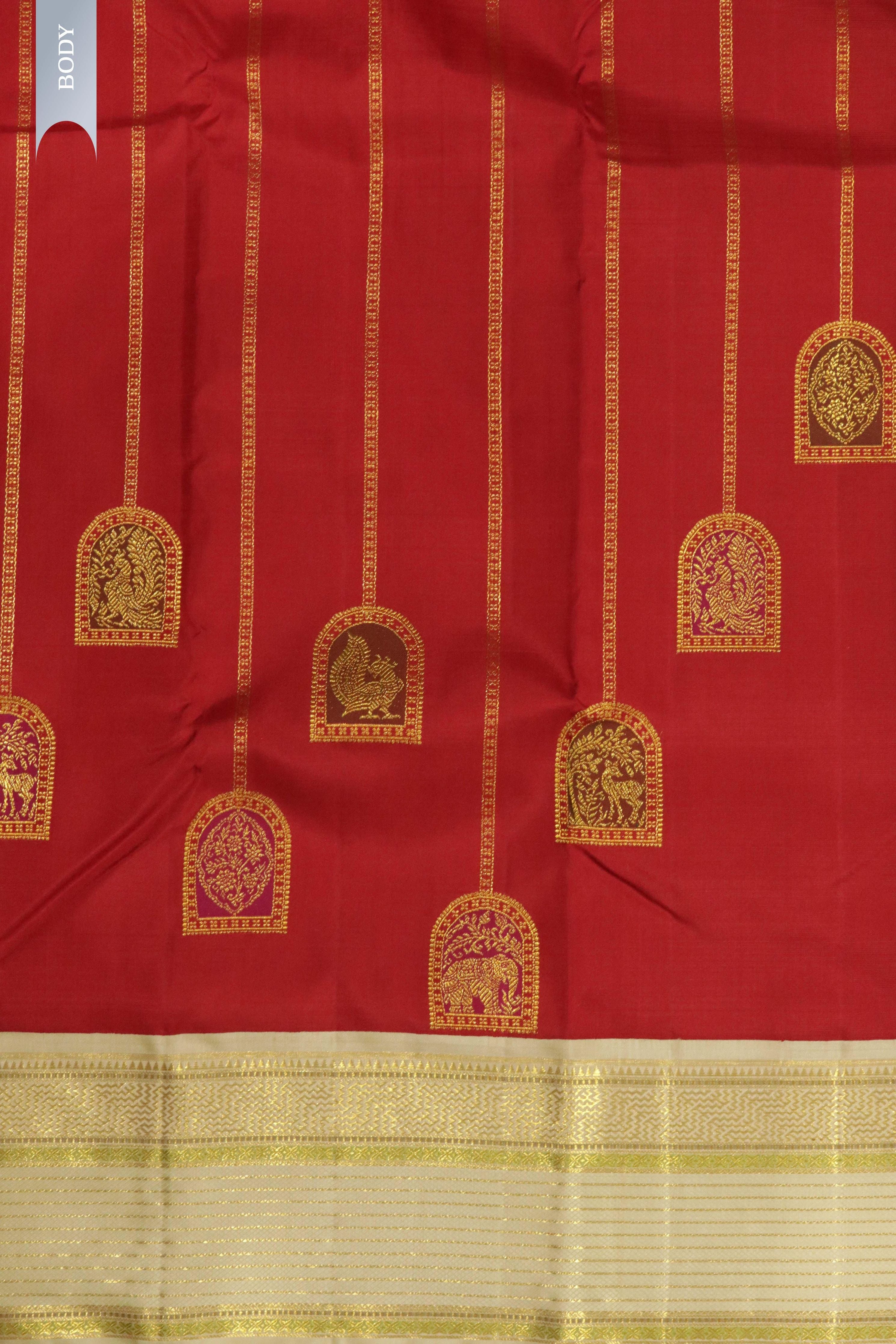 Maroon Kanchipuram Silk Saree with Zari Stripes, Motifs & Contrast Zari Border - Mokshaa