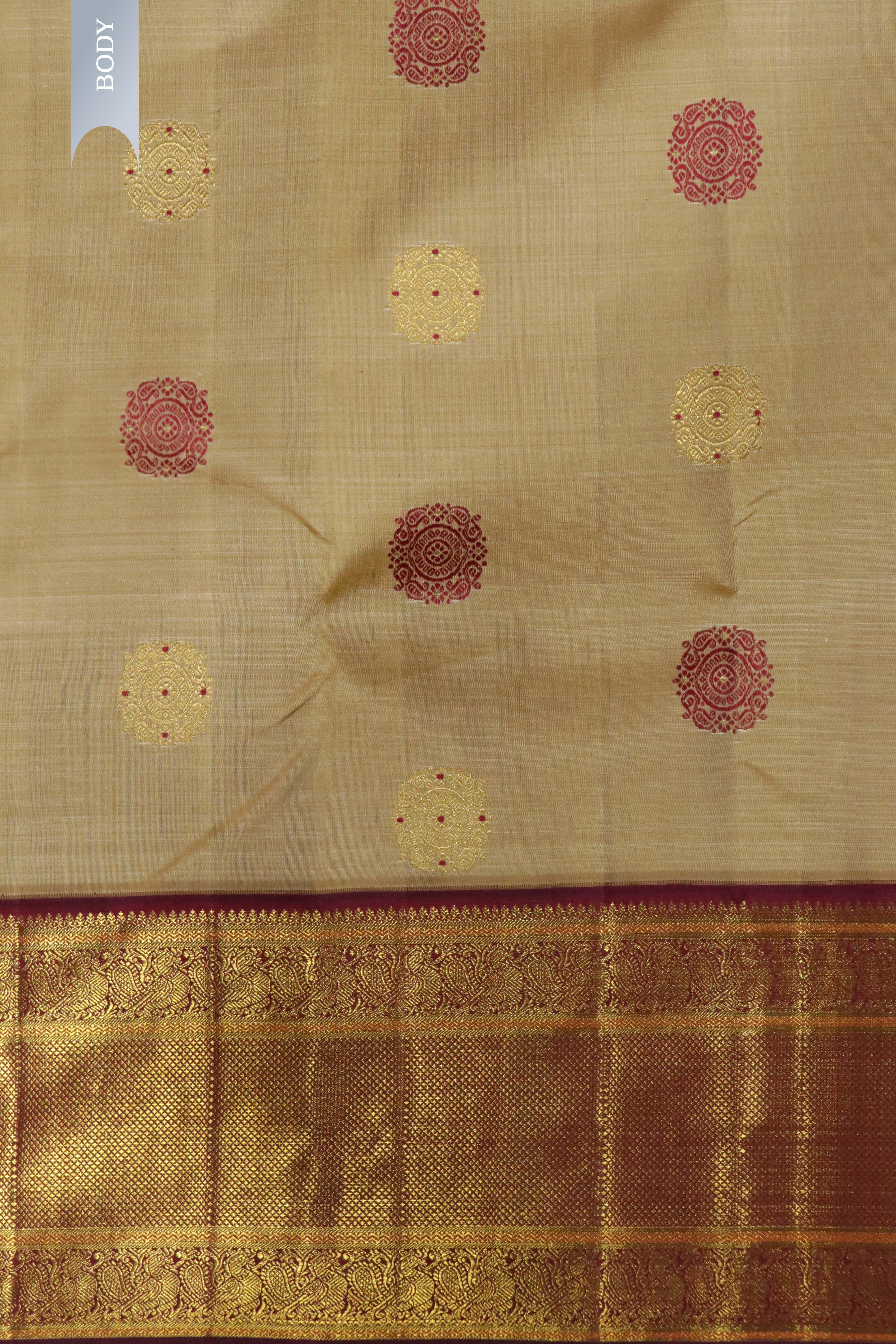Beige Kanchipuram Silk Saree with Zari & Thread Motifs and Contrast Zari Border