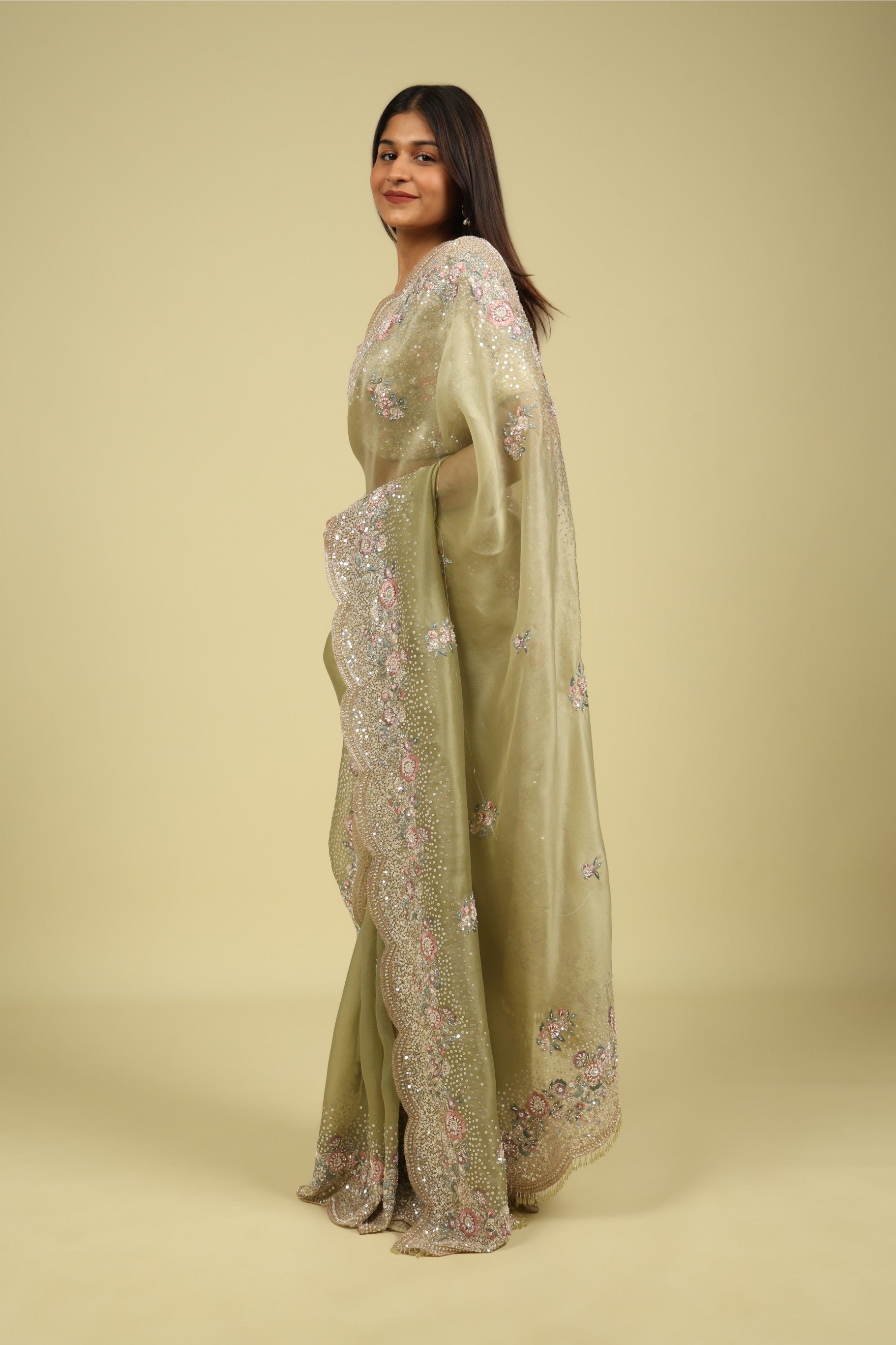 Light Green Organza Saree with Sequin & Thread Embroidery Motifs