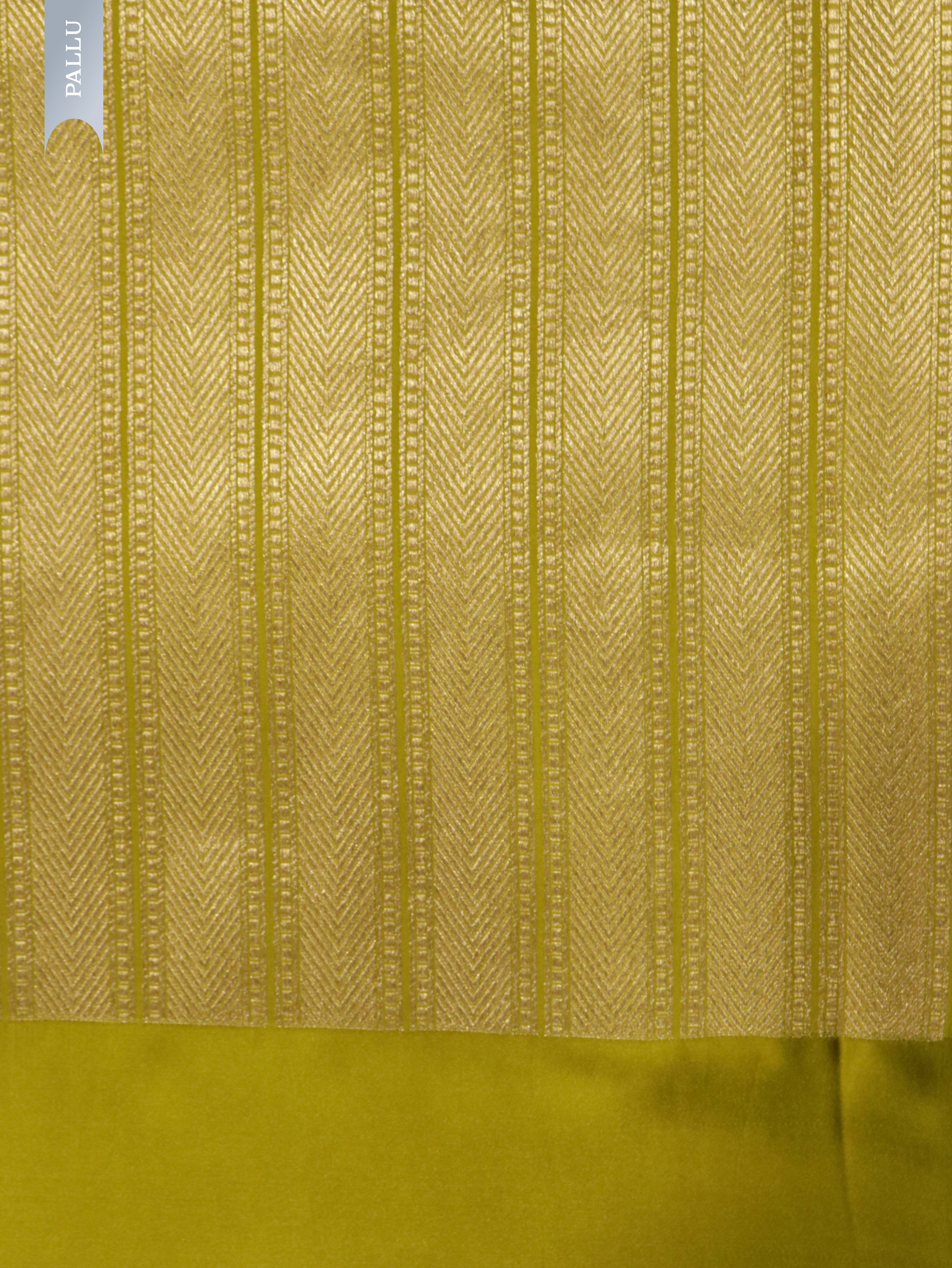 Parrot Green Banarasi Mushroom Silk Saree with Silver Zari Weaving & Gold Zari Butta