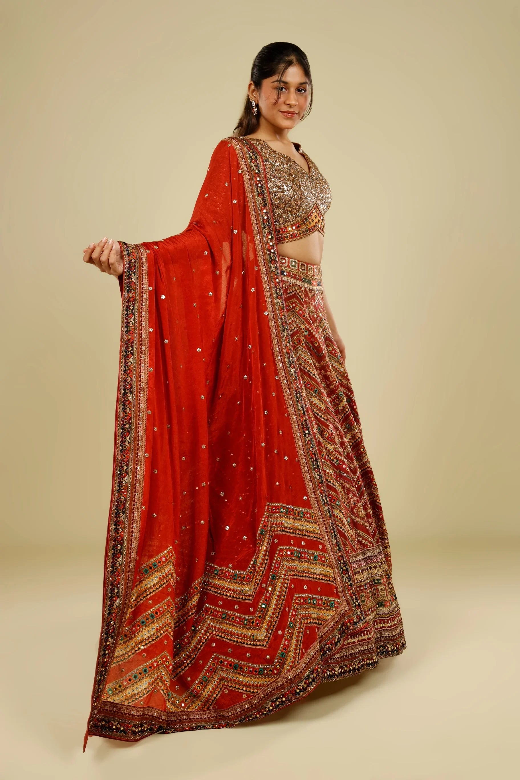 Rust Printed Silk Lehenga Set with Sequin & Kutdana Embroidery | Mokshaa