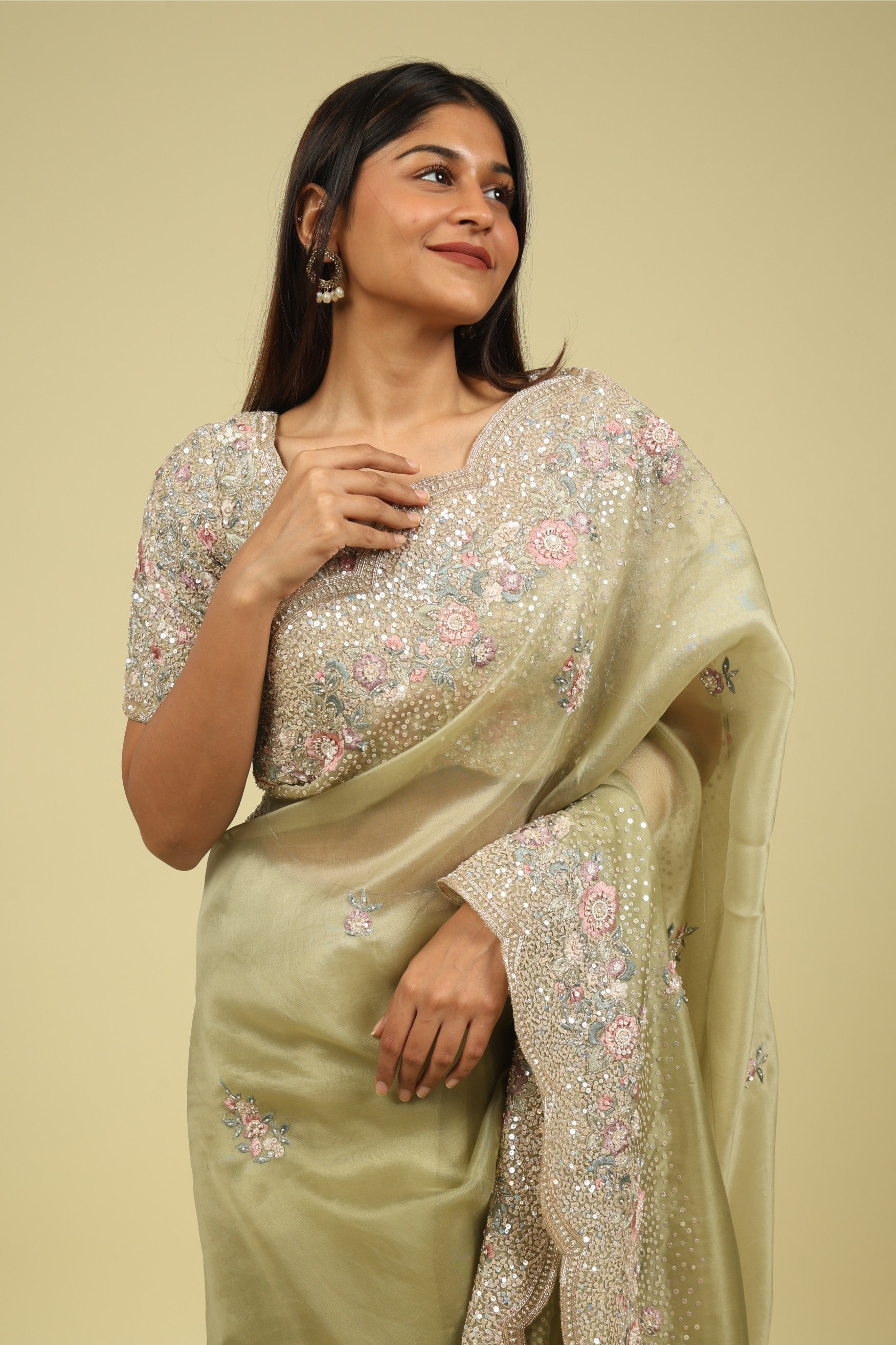 Light Green Organza Saree with Sequin & Thread Embroidery Motifs
