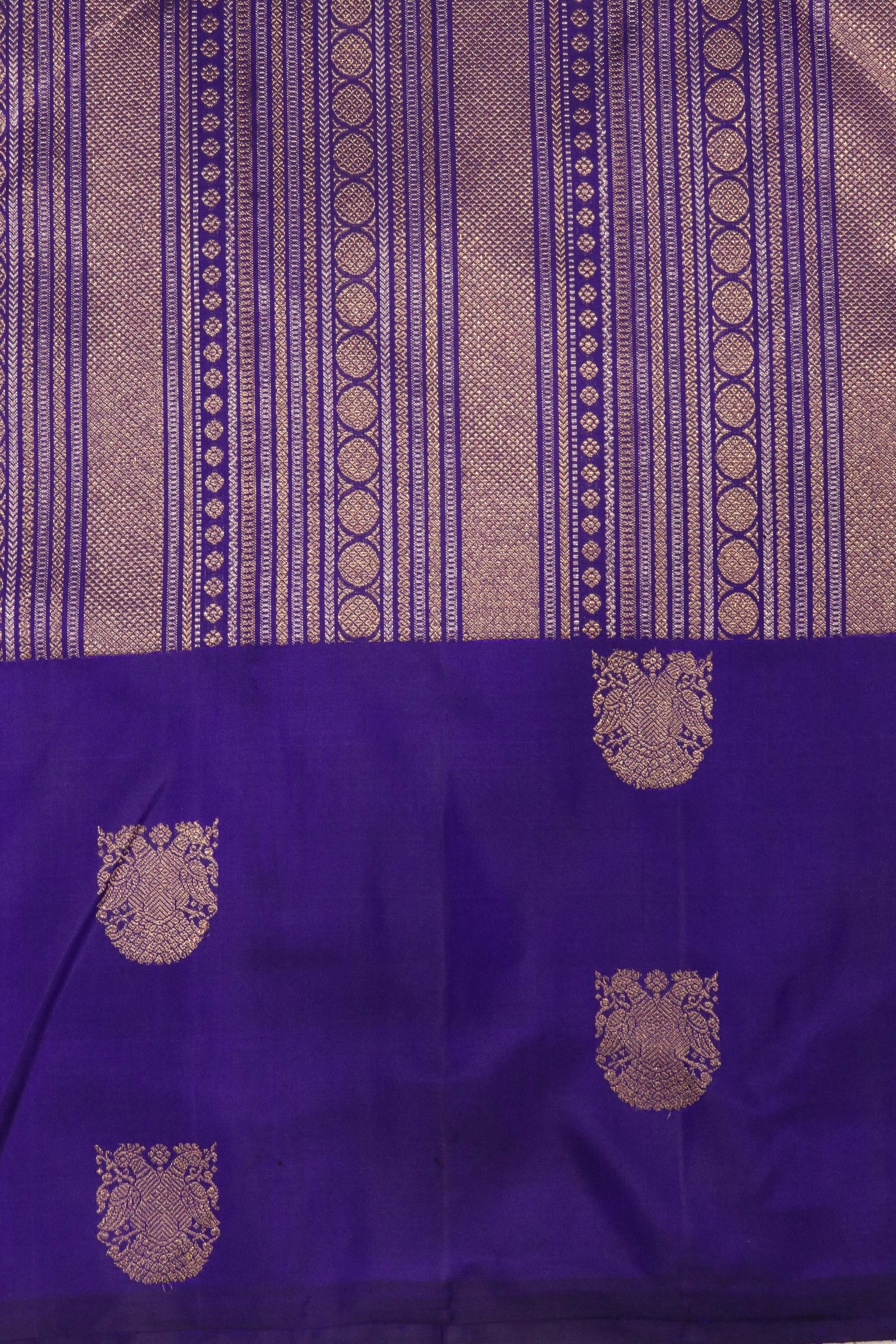 Blue Kanchipuram Silk Saree with Gold & Silver Geometrical Weaving and Zari Motif Border