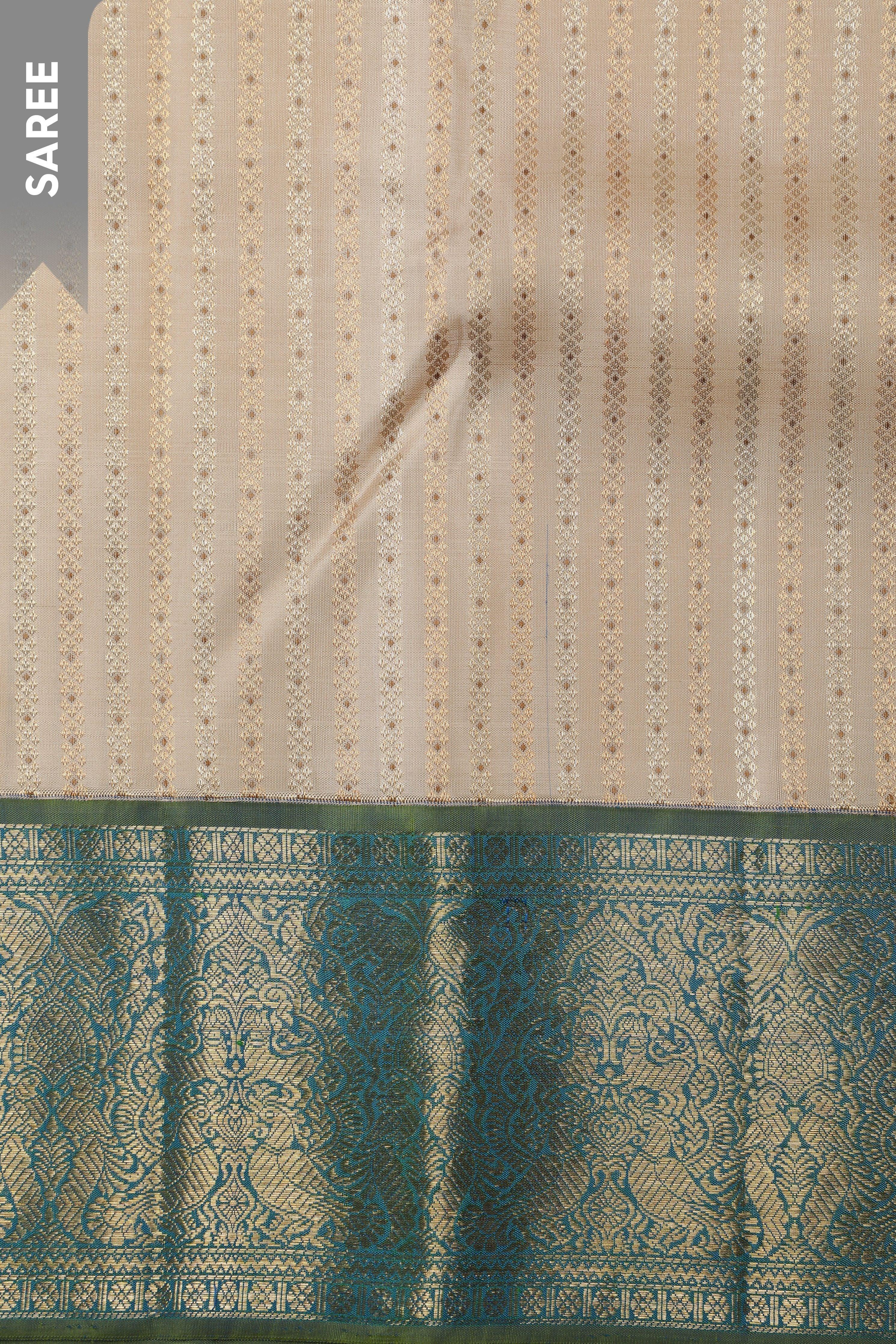 Ivory Kanchipuram Silk Saree with Peacock Blue Zari Border - Mokshaa