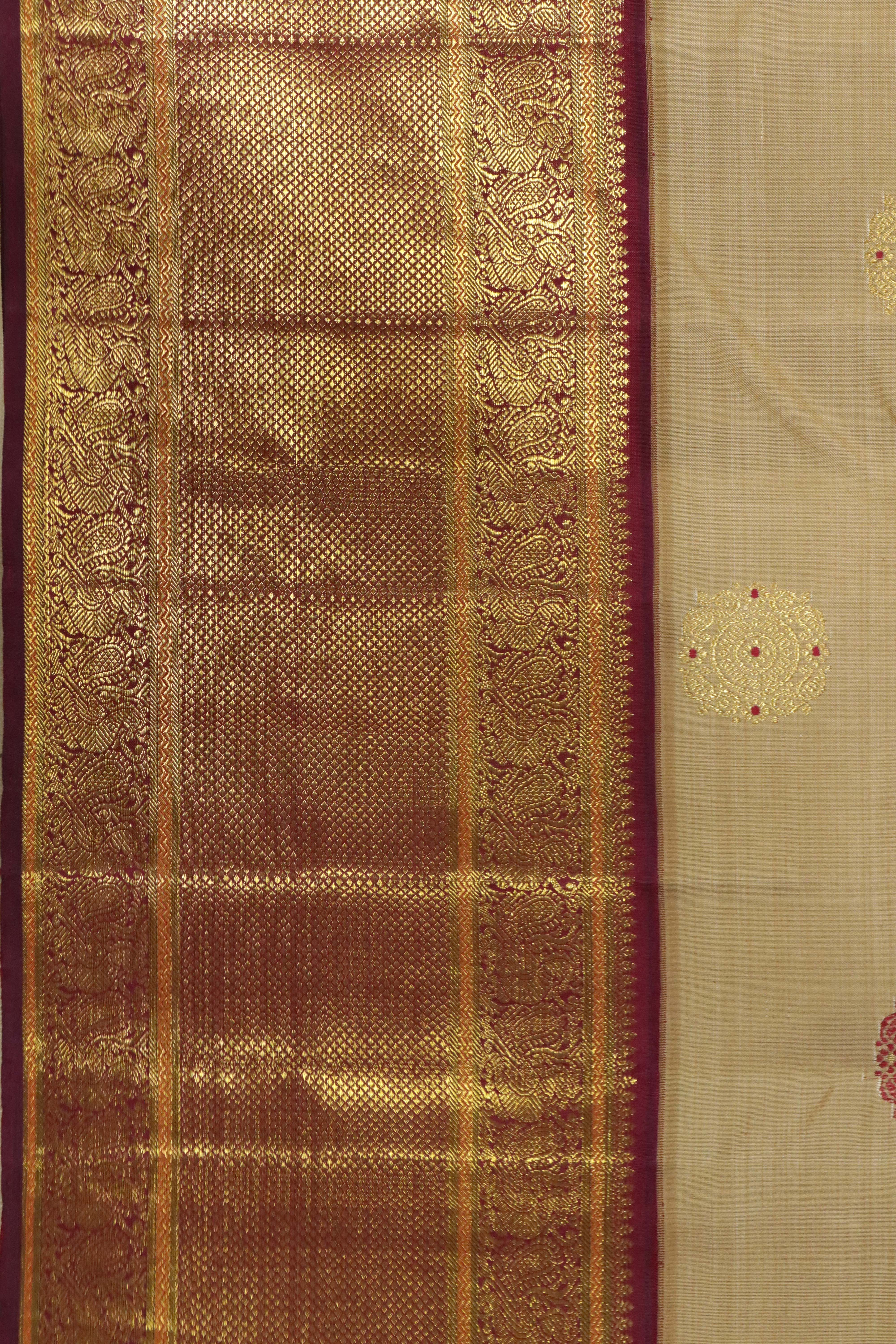 Beige Kanchipuram Silk Saree with Zari & Thread Motifs and Contrast Zari Border