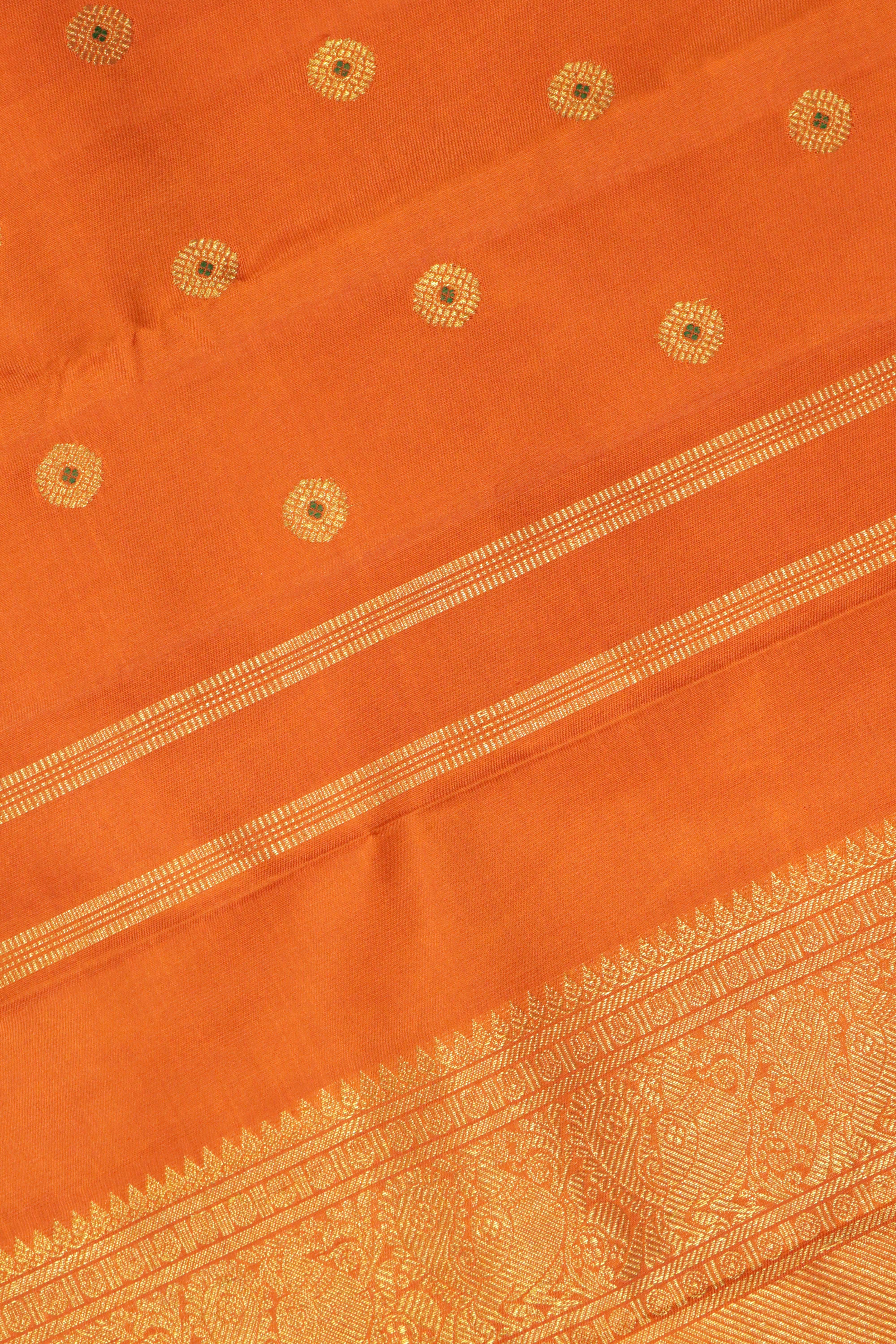 Orange Kanchipuram Silk Saree with All-Over Motifs and Zari Border
