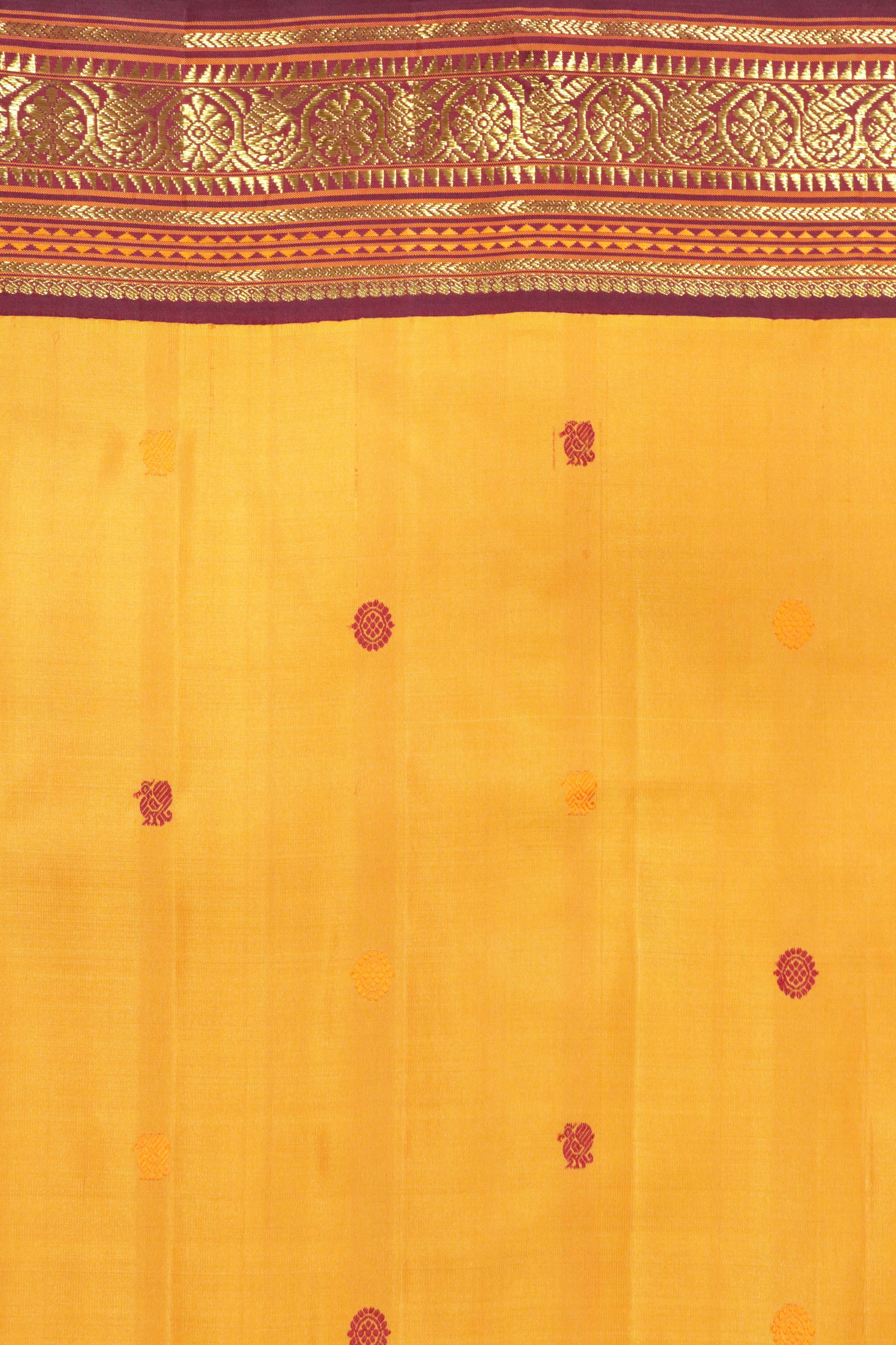 Pastel Orange Kanchipuram Silk Saree with Silk Thread Motifs & Contrast Zari Border