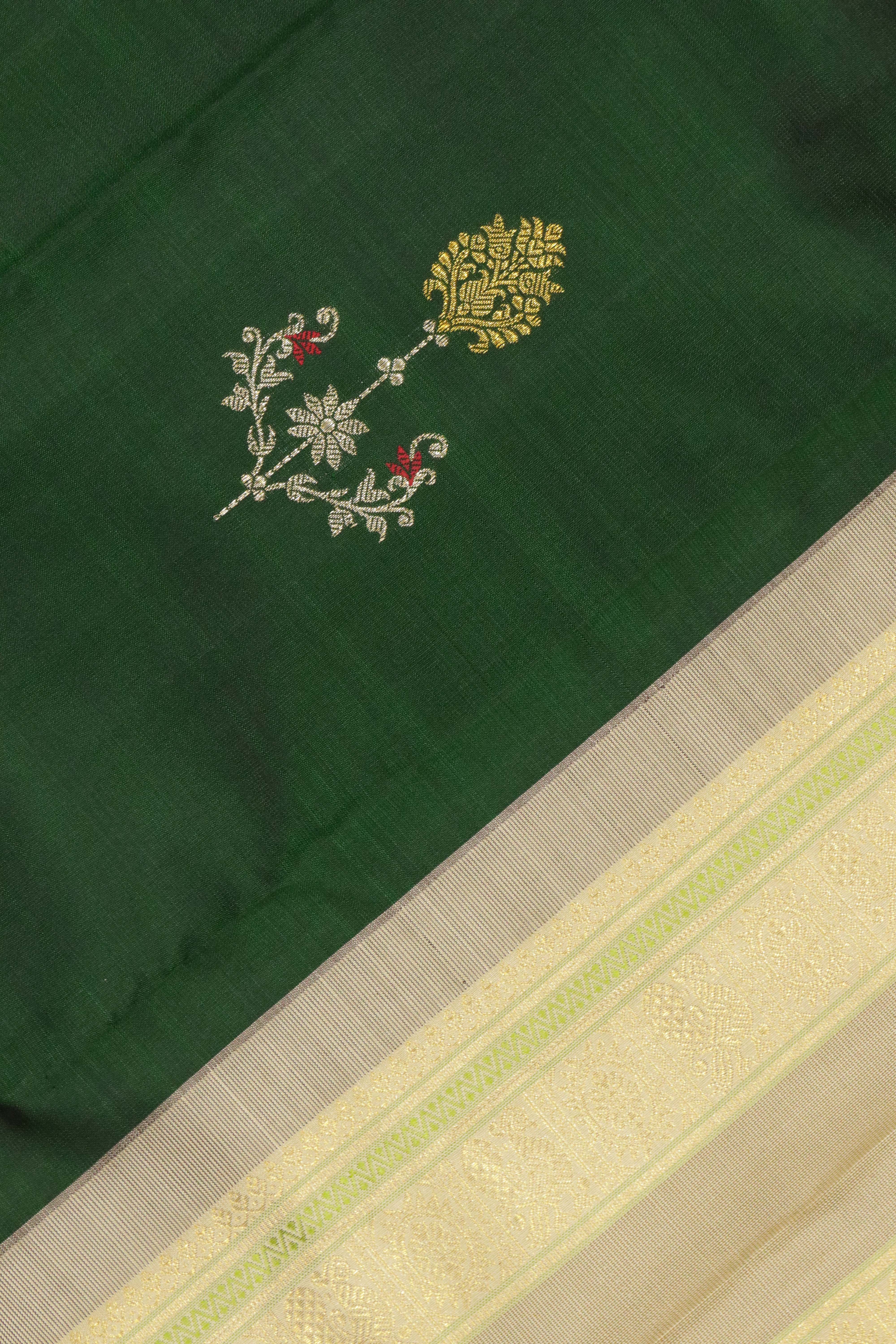 Bottle Green Kanchipuram Silk Saree with Silver & Gold Zari Thread Motifs and Contrast Border