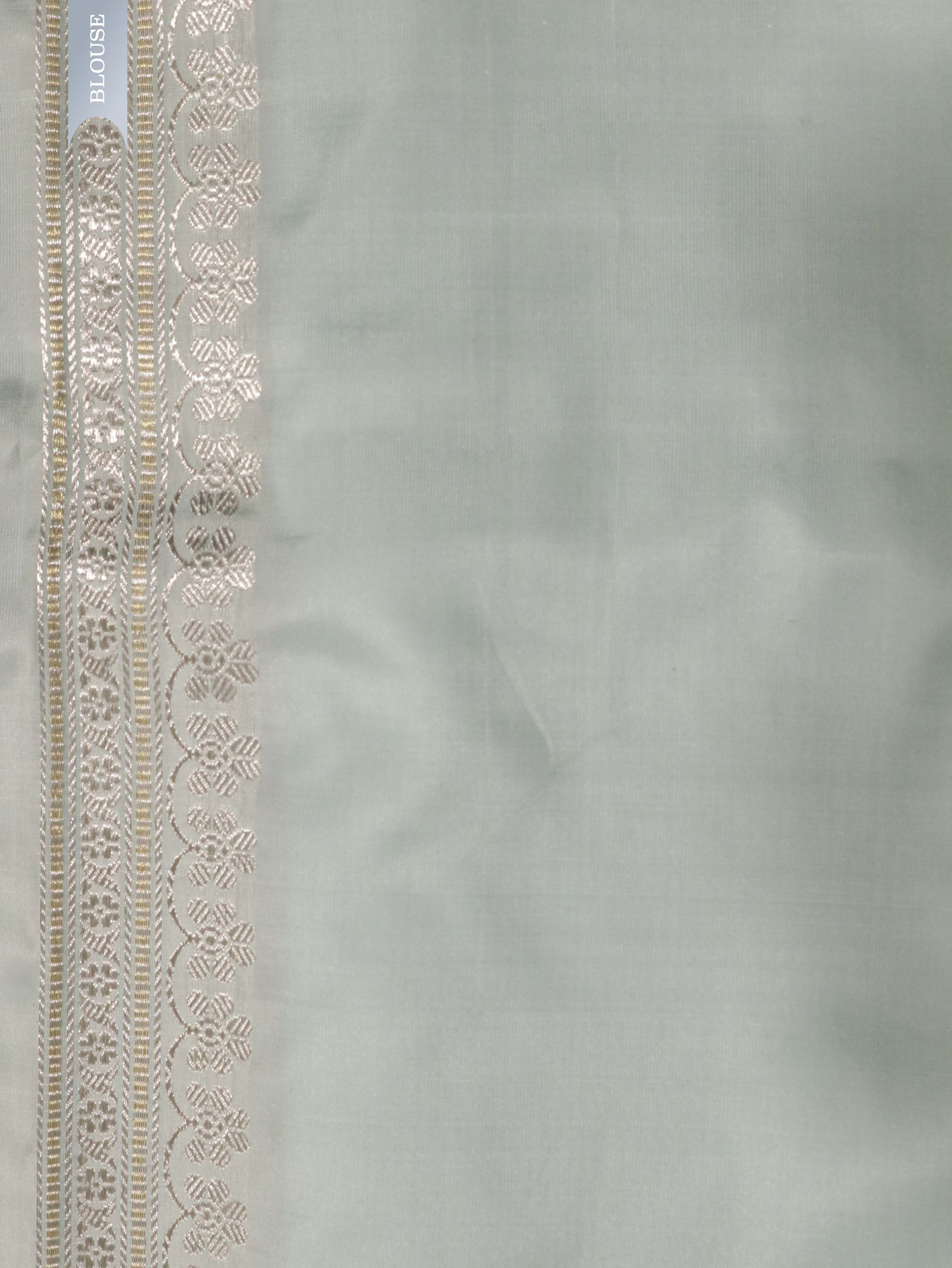 Light Blue Banarasi Silk Saree with Silver–Gold Zig-Zag Weave & Contrast Satin Border