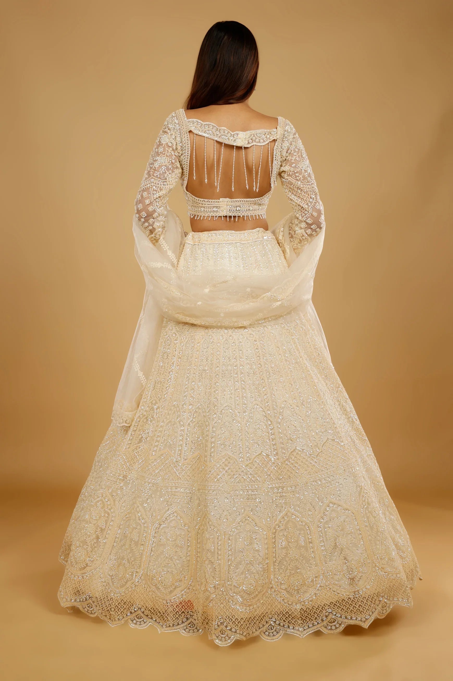 Ivory Gold Net Lehenga Set with Sequin, Cutdana & Pearl Embroidery - Mokshaa