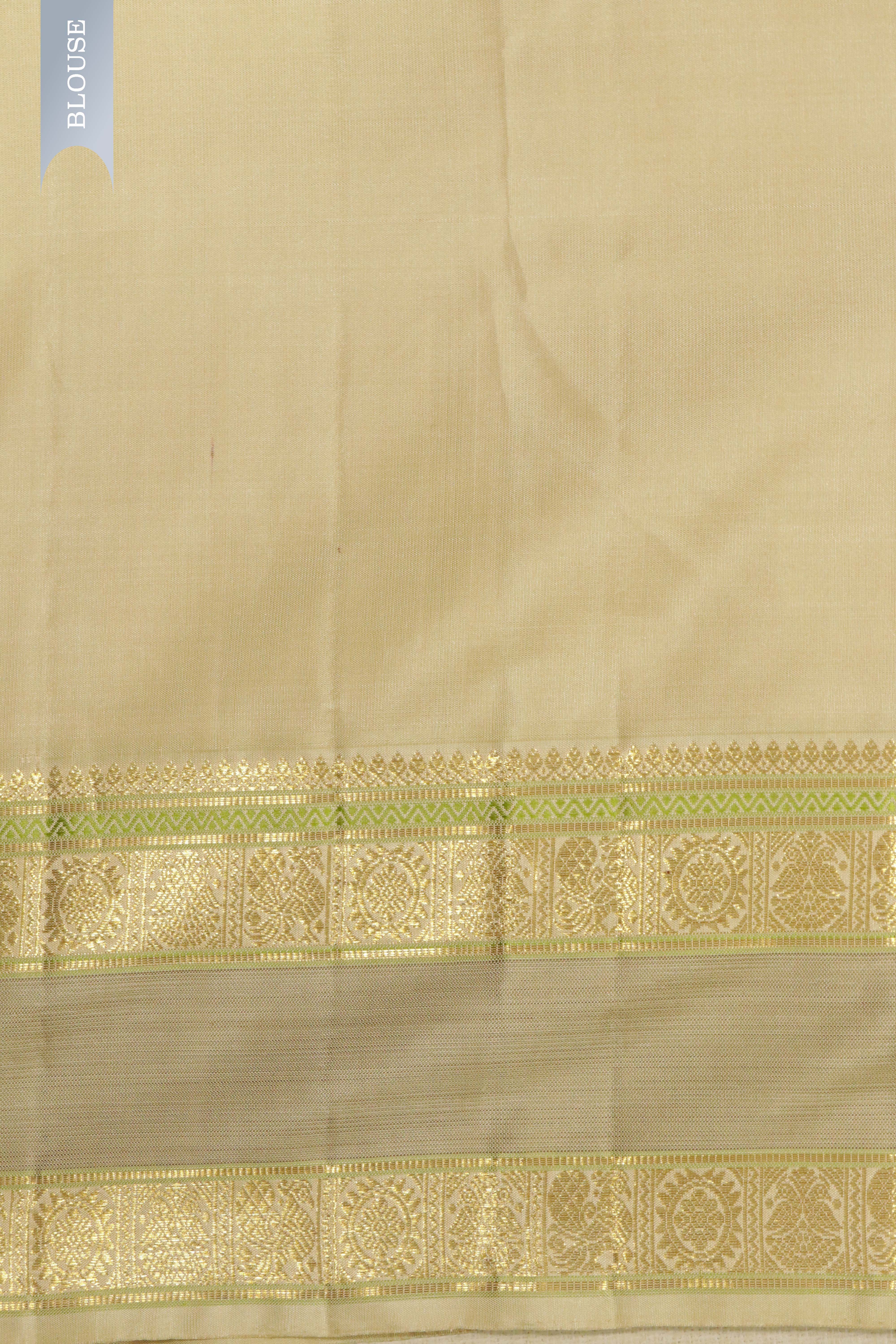 Bottle Green Kanchipuram Silk Saree with Silver & Gold Zari Thread Motifs and Contrast Border