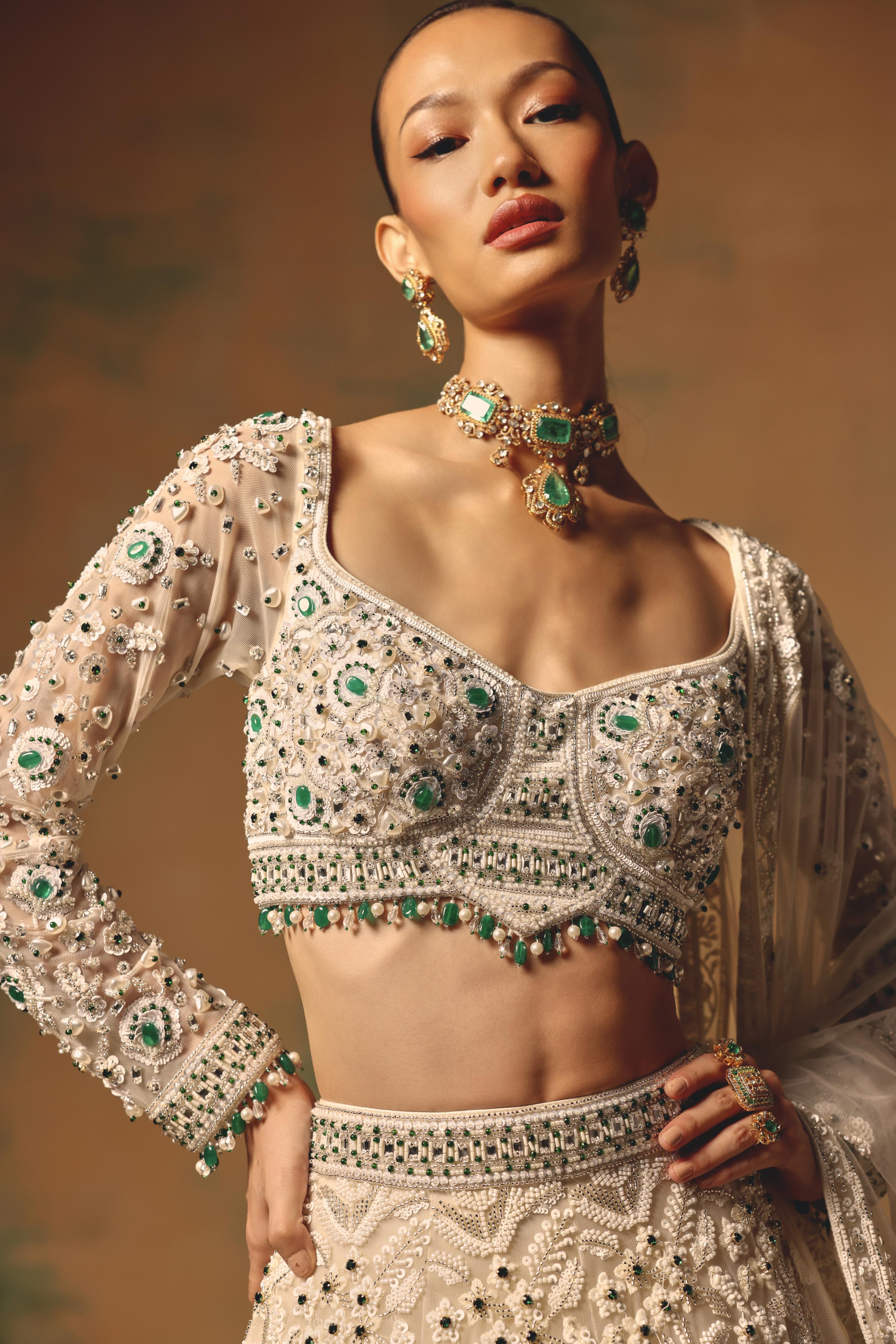Ivory Net Lehenga with Emerald Embellishments