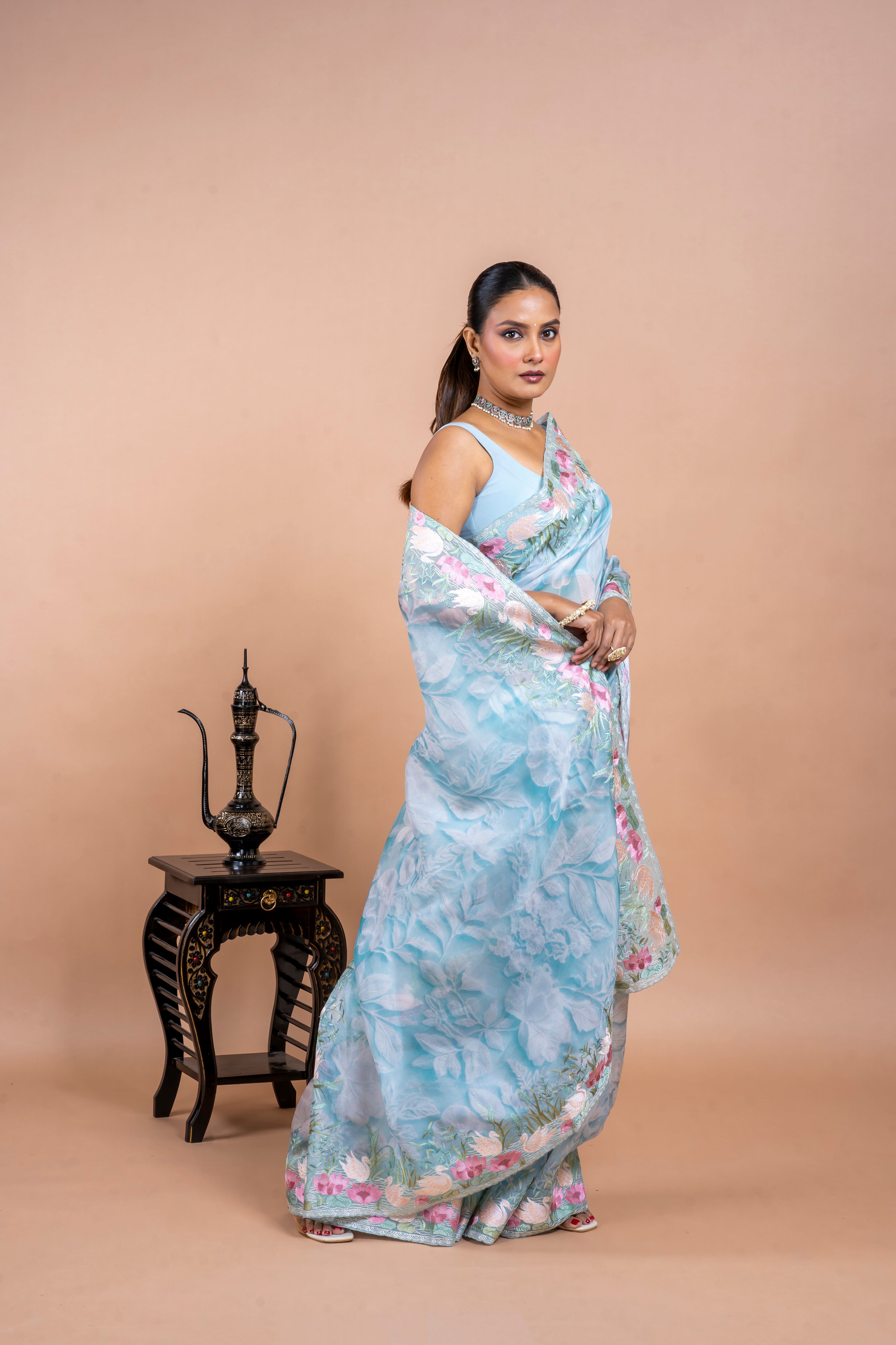 Sea Blue Organza Saree with Printed Body and Zari Border Mokshaa