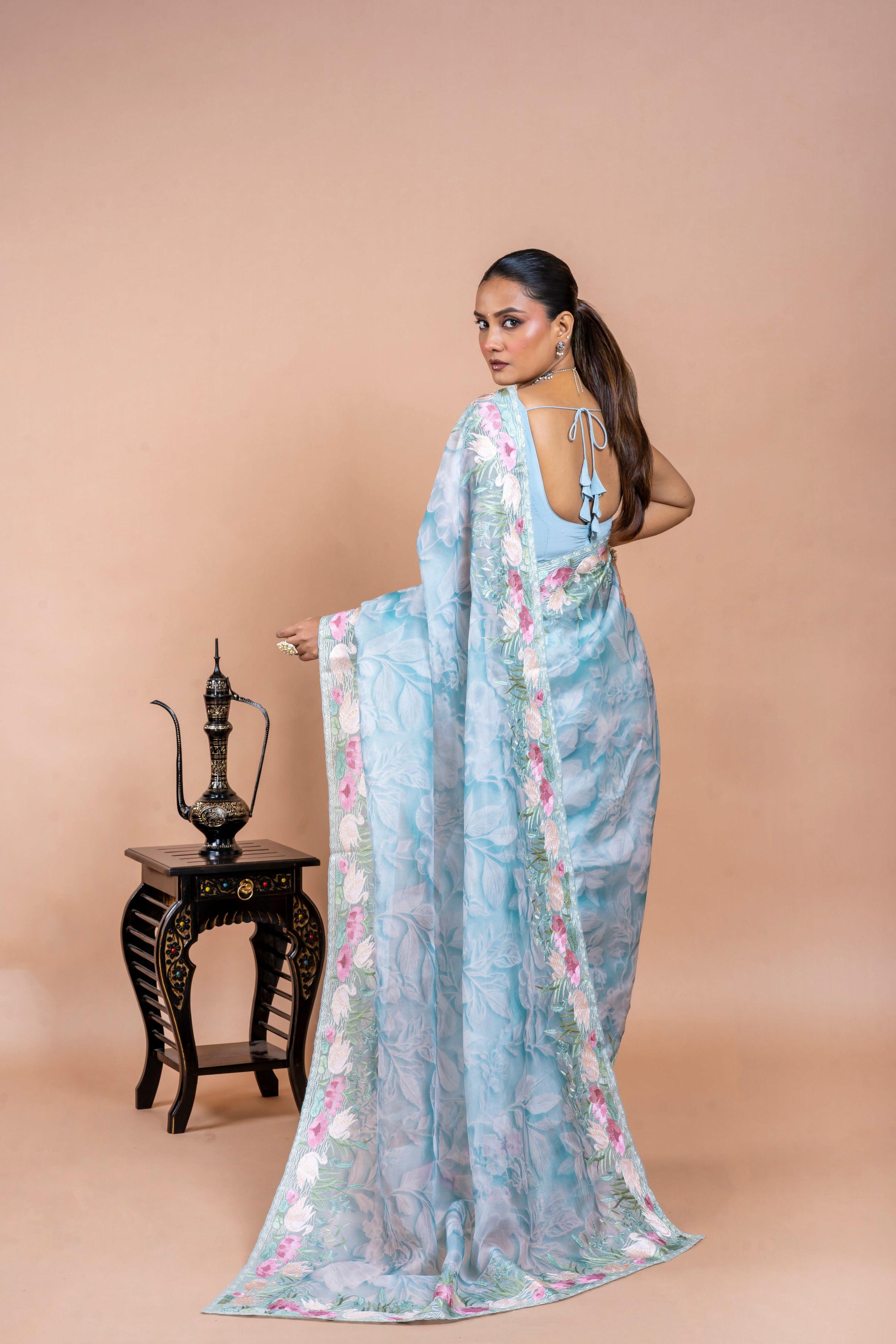 Sea Blue Organza Saree with Printed Body and Zari Border Mokshaa