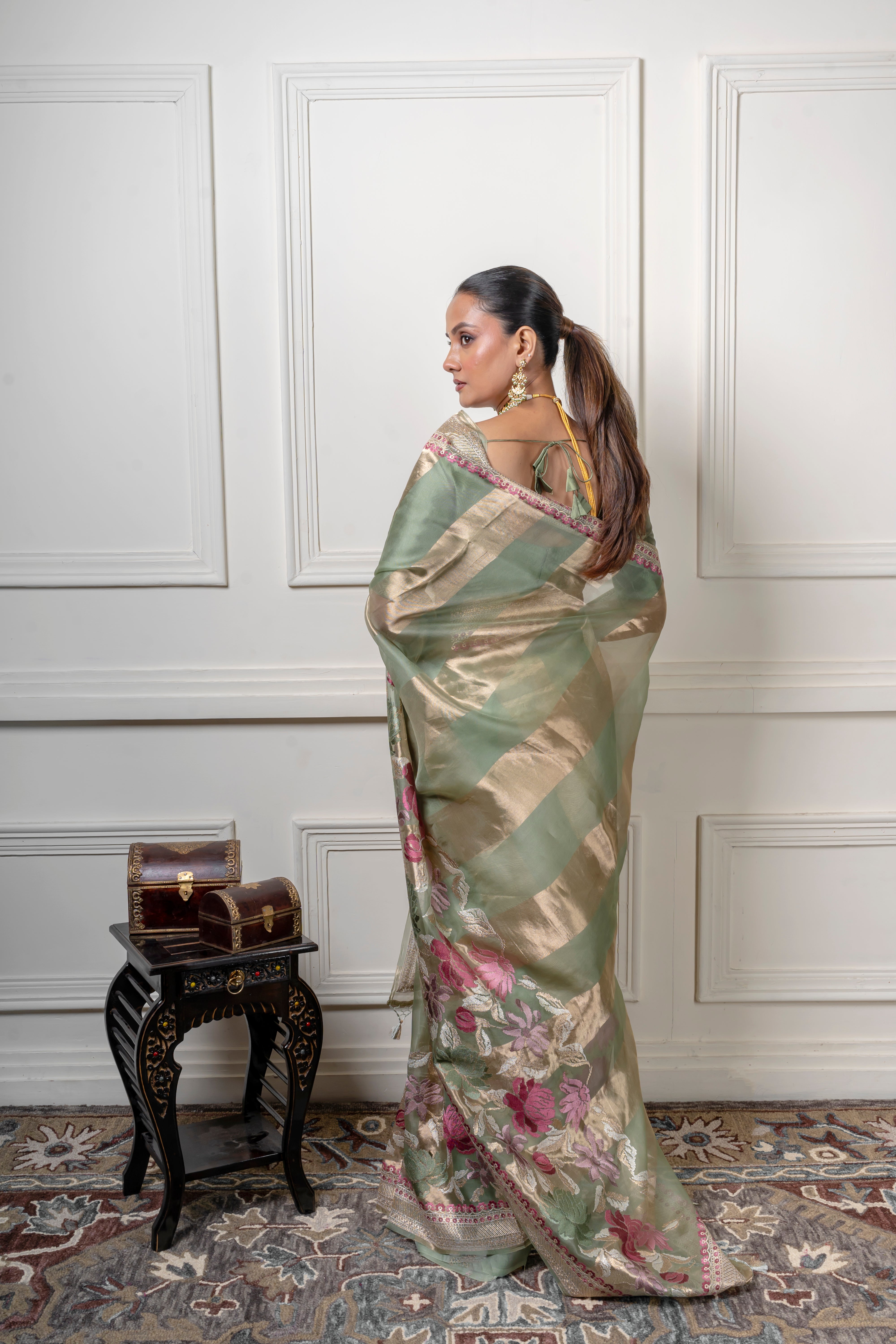Green Organza Saree with Gold Zari StripeĀ Mokshaa