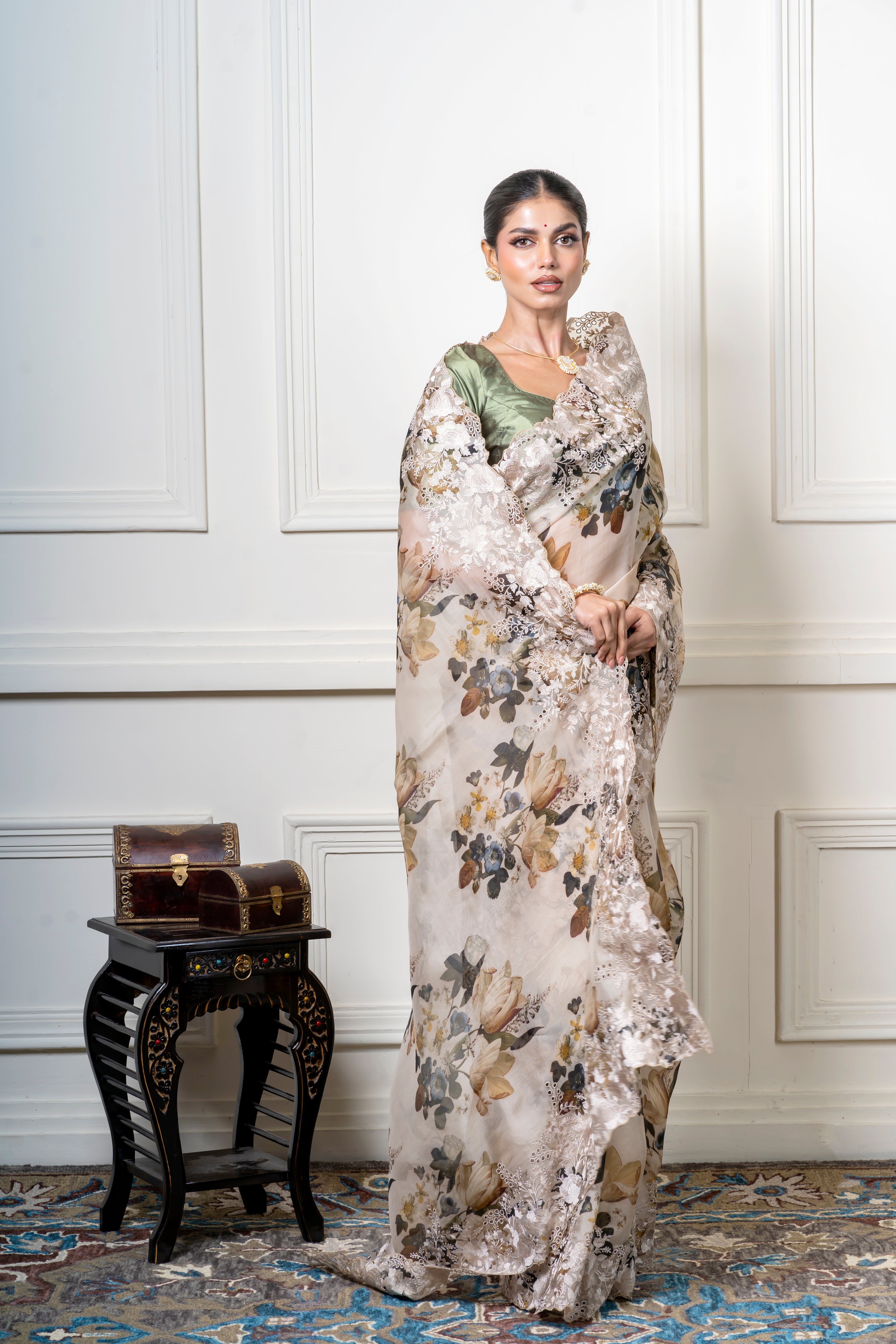Ivory Organza Saree with Muted Floral Print and Lace BorderĀ Mokshaa