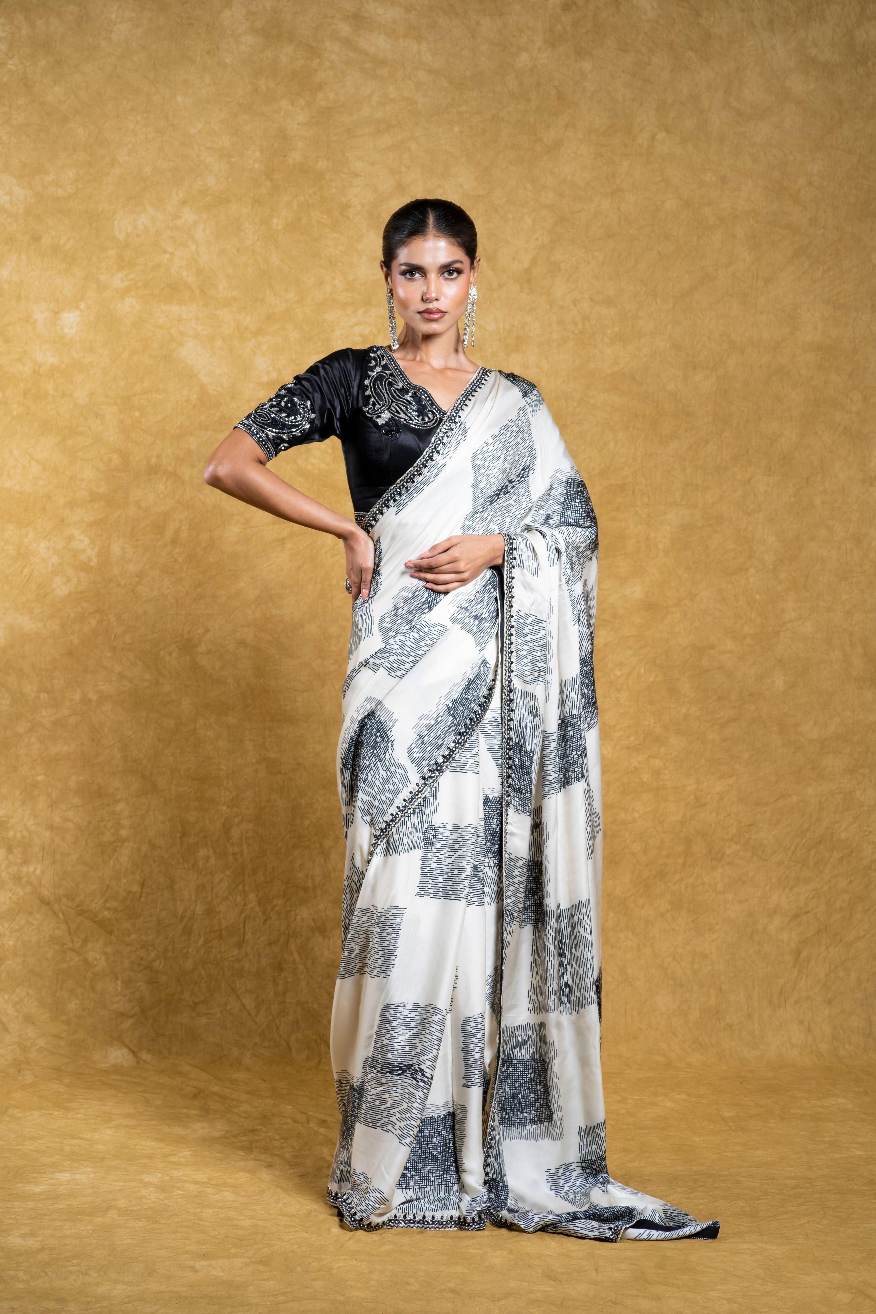 White Satin Silk Saree with Abstract Patterns and Sequins Border  Mokshaa