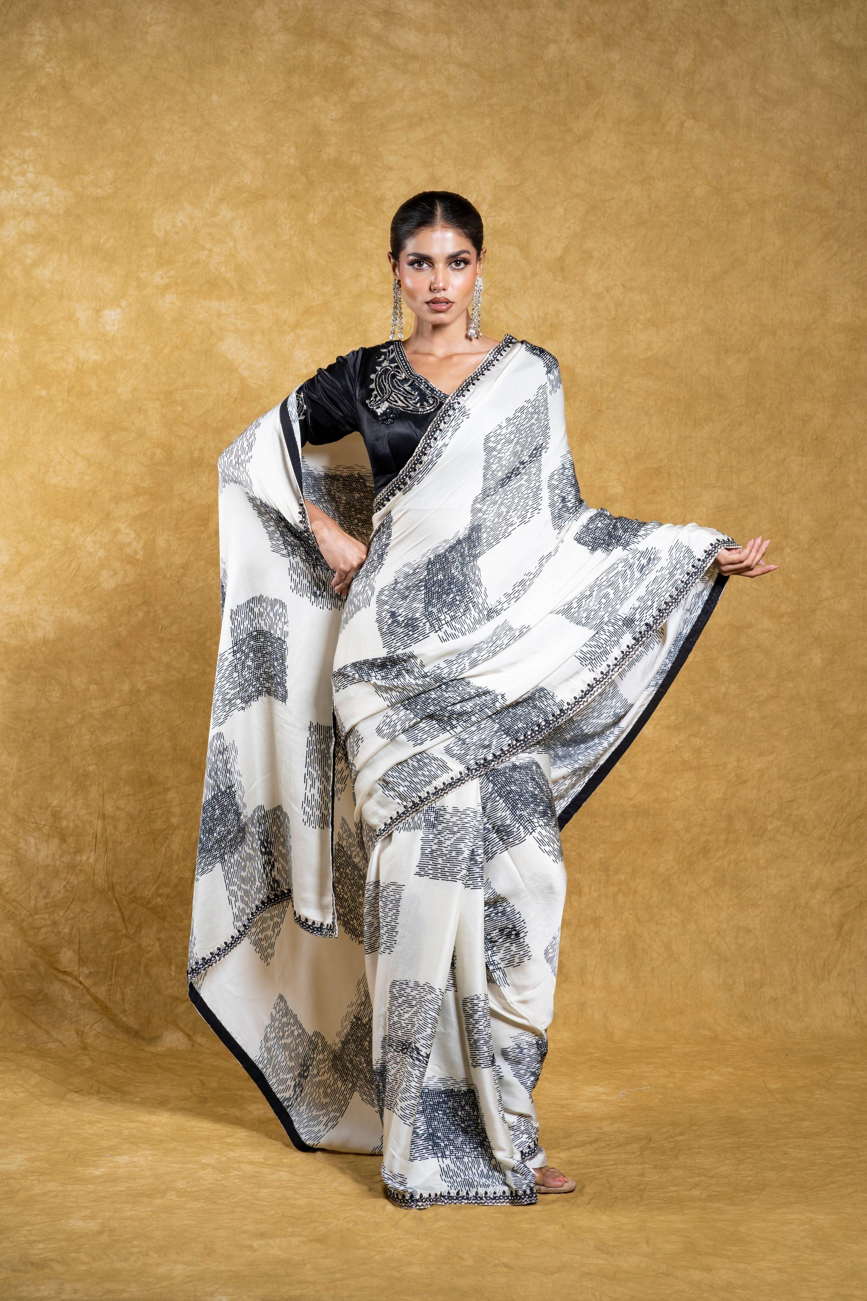 White Satin Silk Saree with Abstract Patterns and Sequins Border  Mokshaa