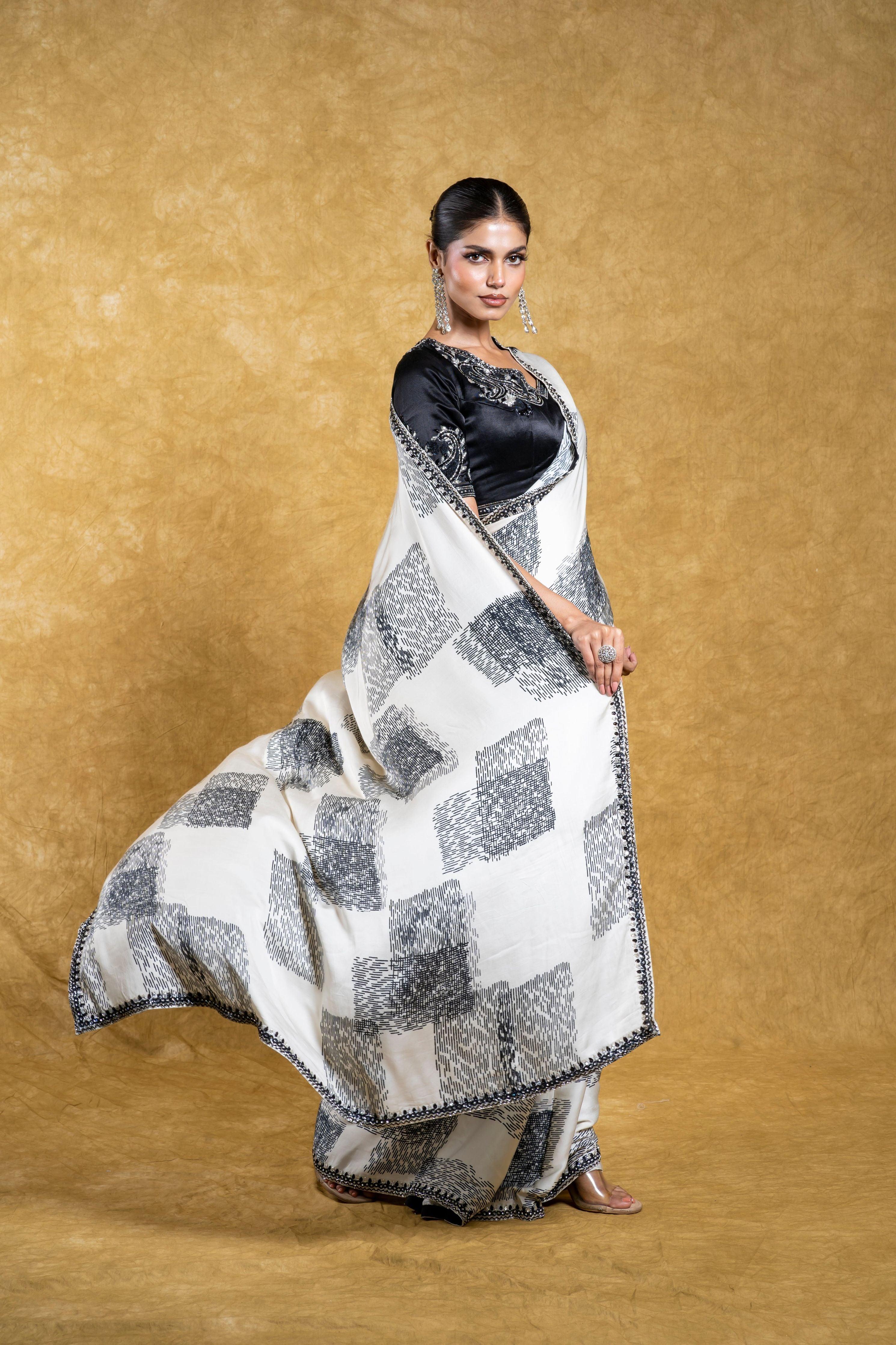 White Satin Silk Saree with Abstract Patterns and Sequins Border  Mokshaa