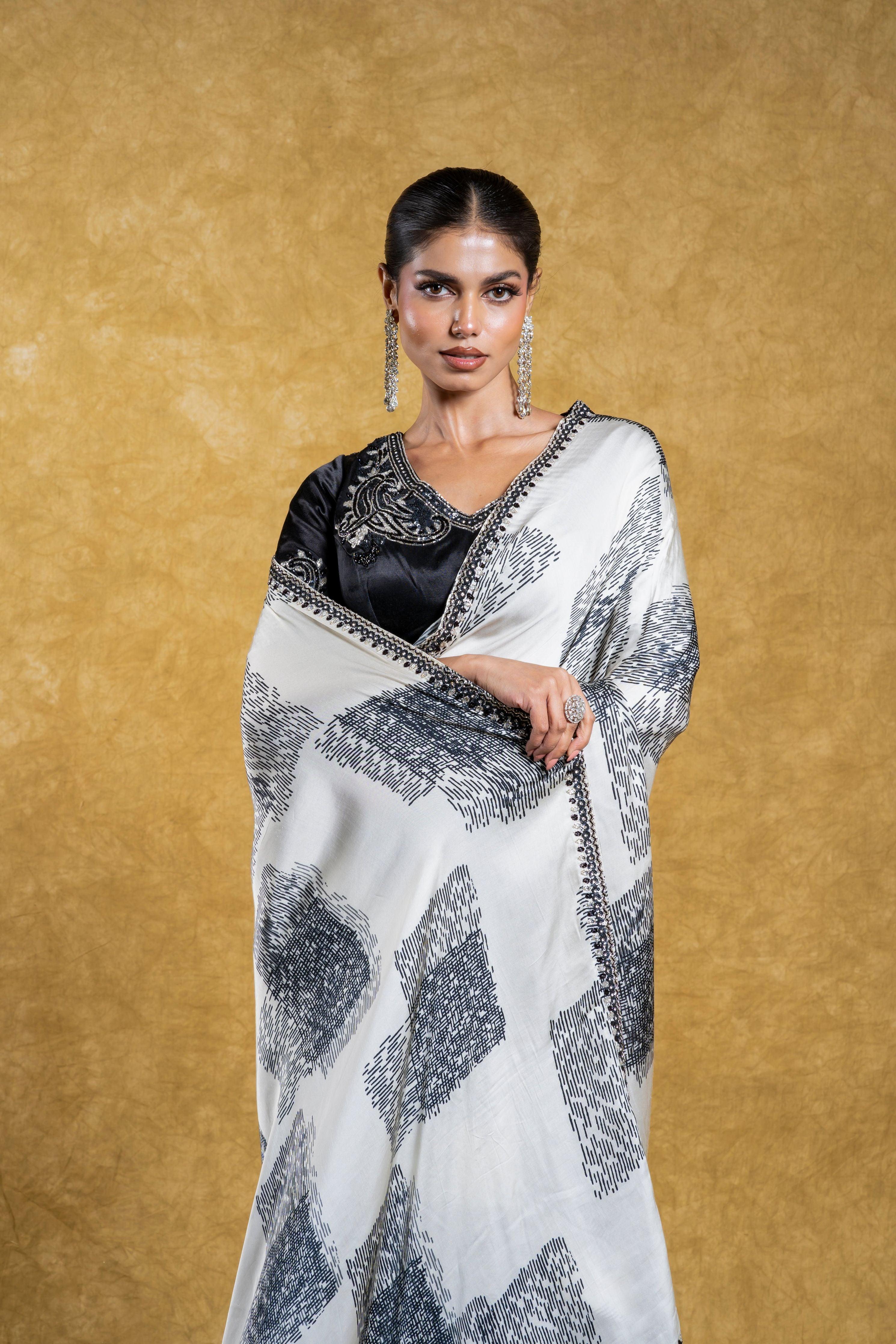 White Satin Silk Saree with Abstract Patterns and Sequins Border  Mokshaa