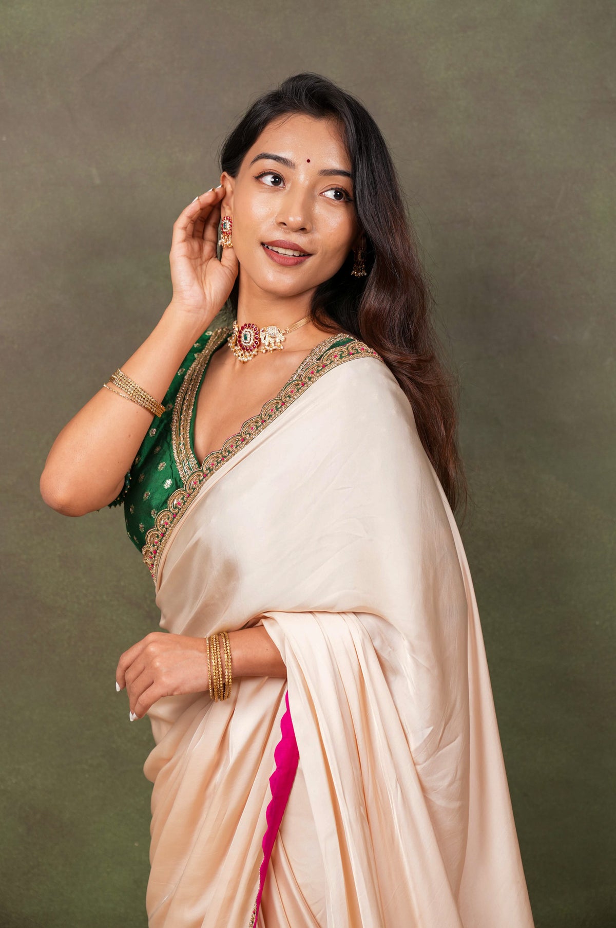 Peach Satin Saree with Green Embroidered Border