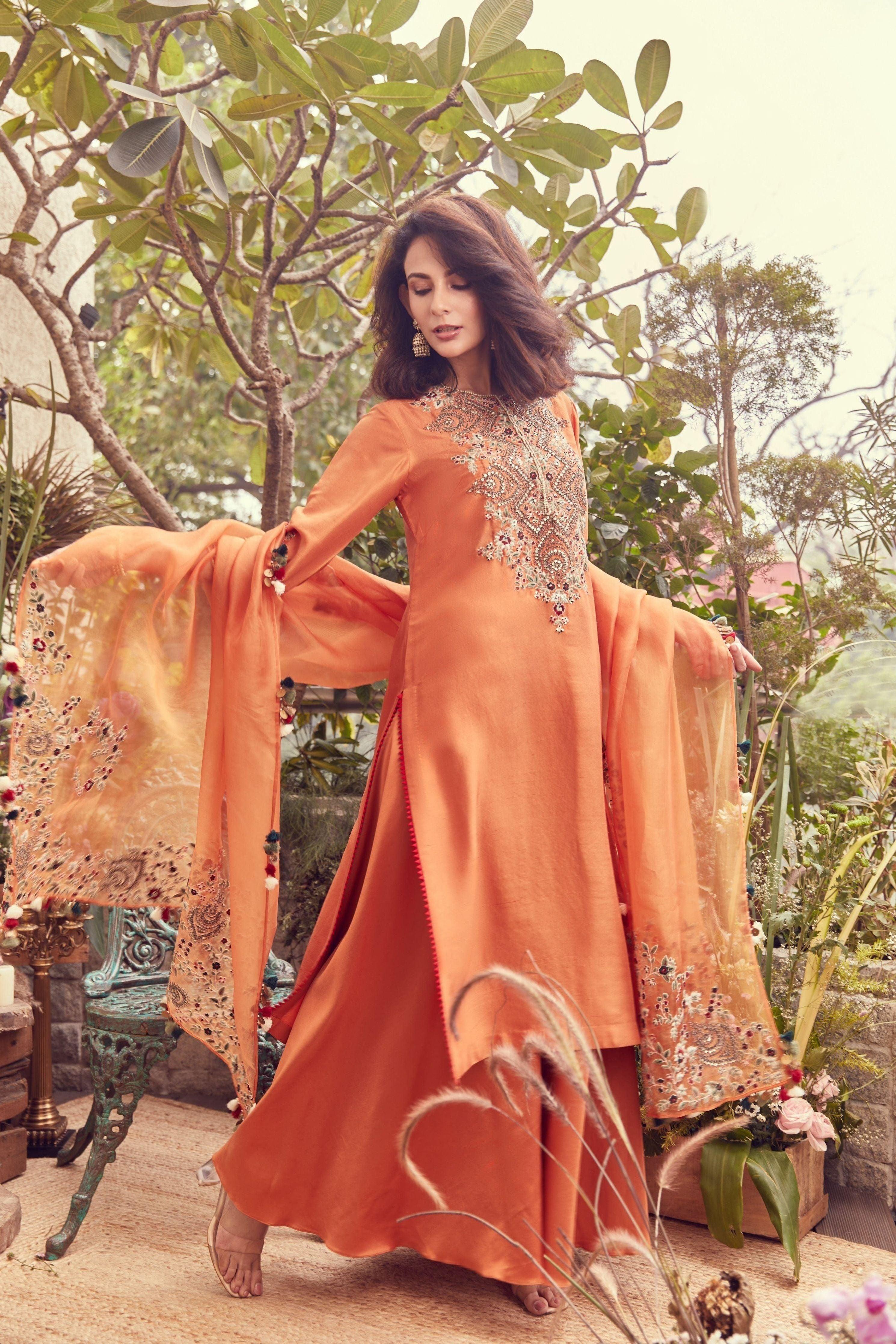 Rust silk kurta with cotton satin sharara and organza dupatta  Mokshaa