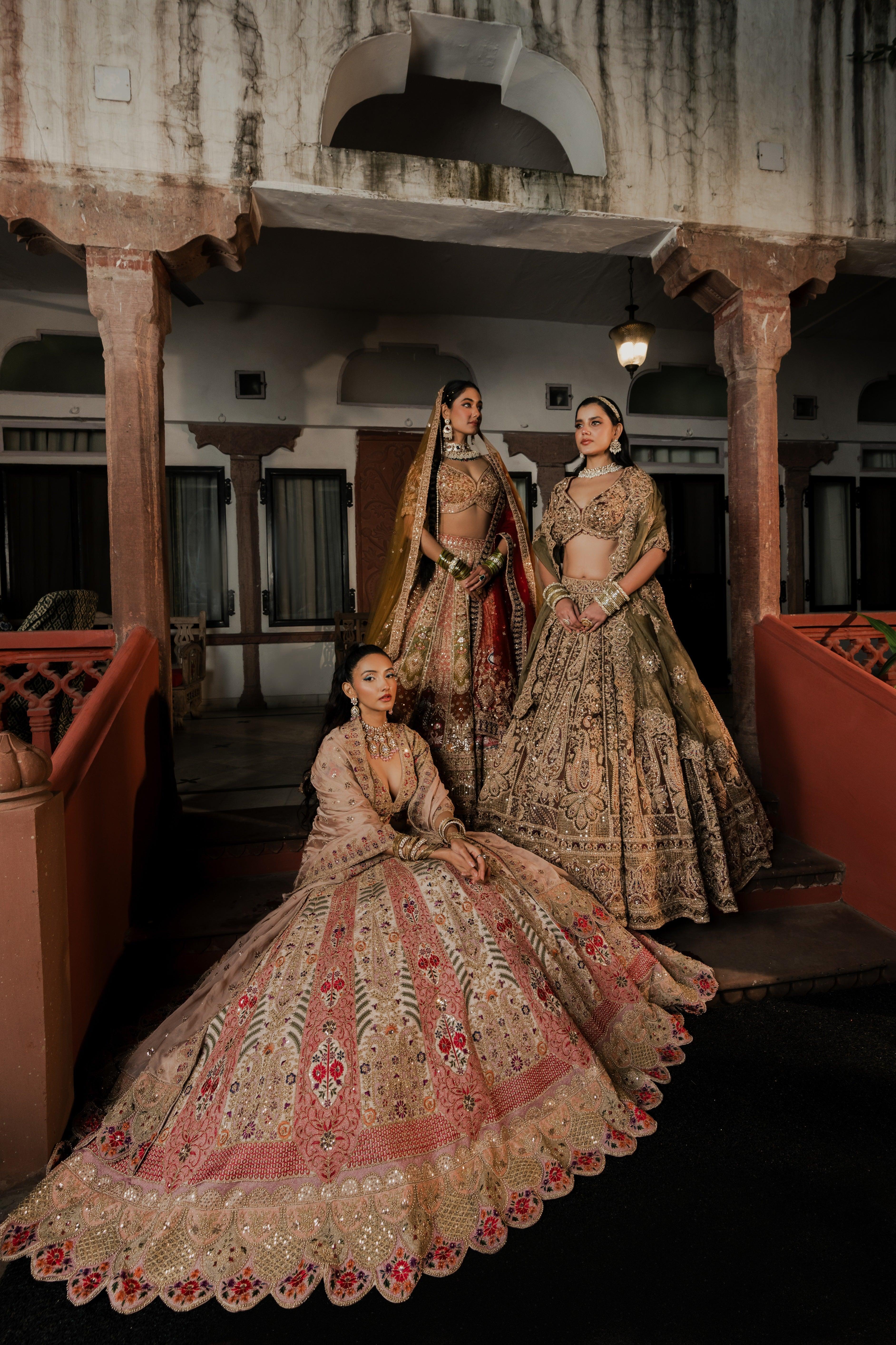 Multicolour Raw Silk Bridal Lehenga with Heavy Zardosi, Resham & Sequin Embroidery Mokshaa