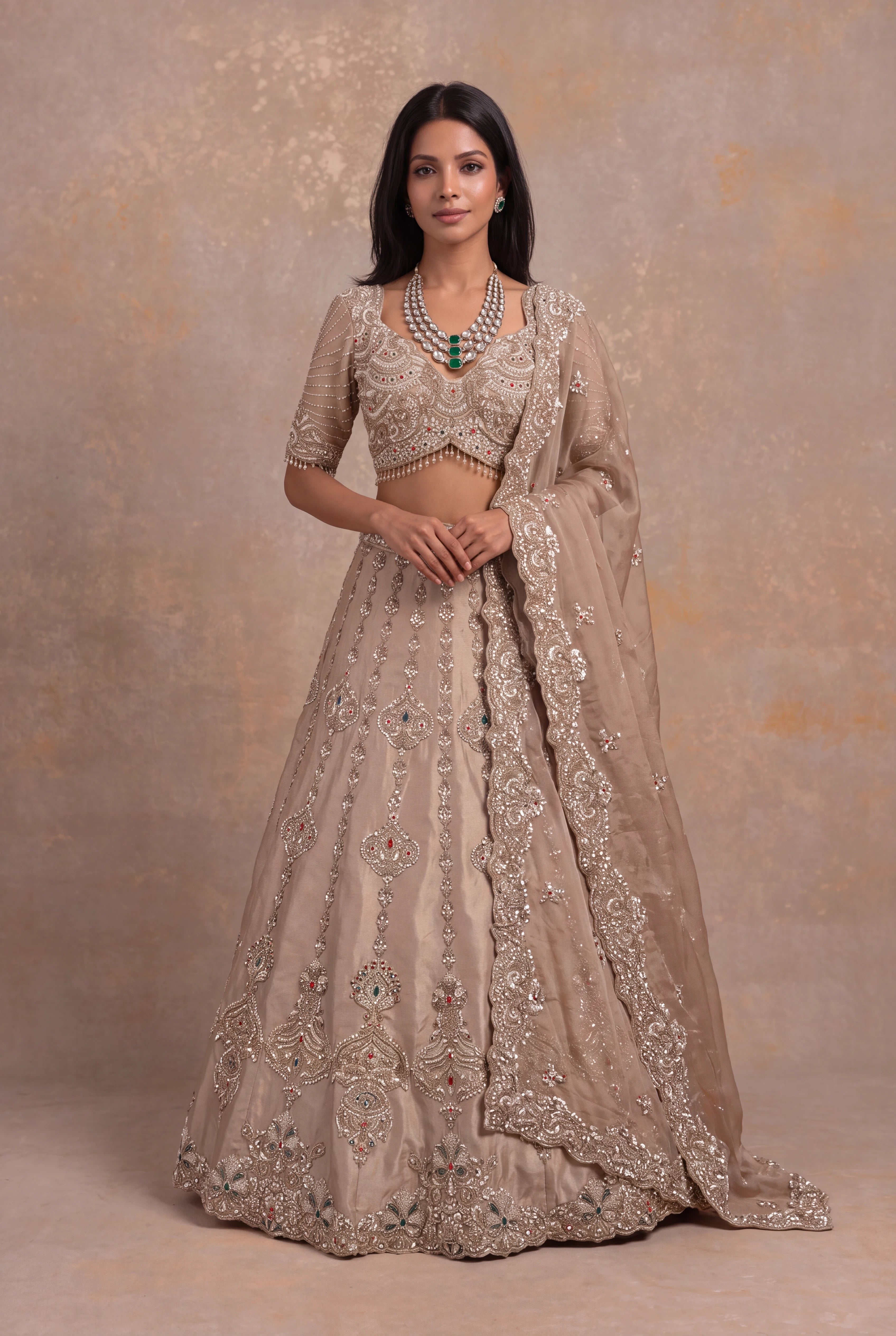 Golden Tissue Lehenga with Multicolour Kundan & Sequin Embroidery