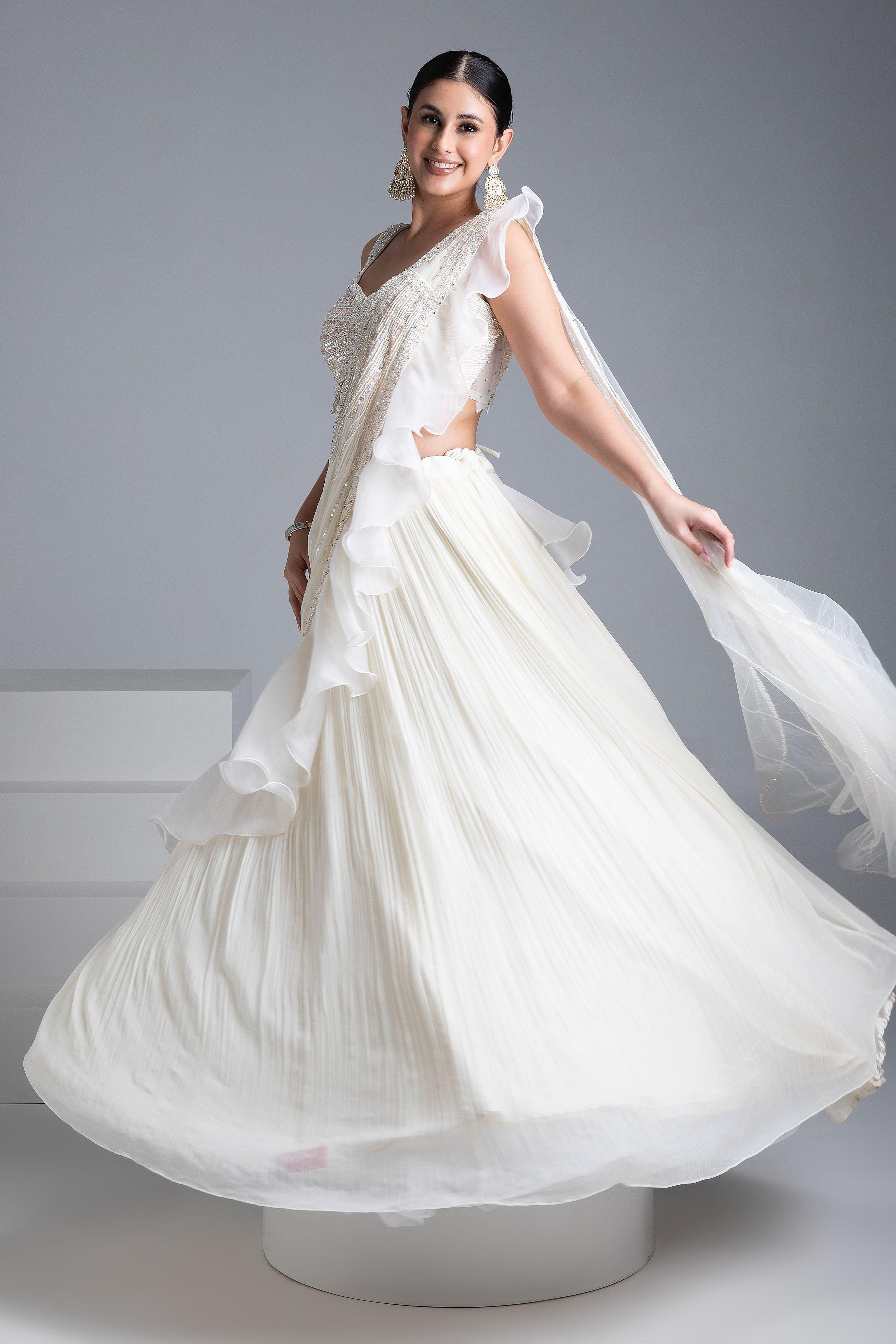 Ivory Georgette Pleated Lehenga Set with Bead and Pearl Embroidered Blouse - Mokshaa