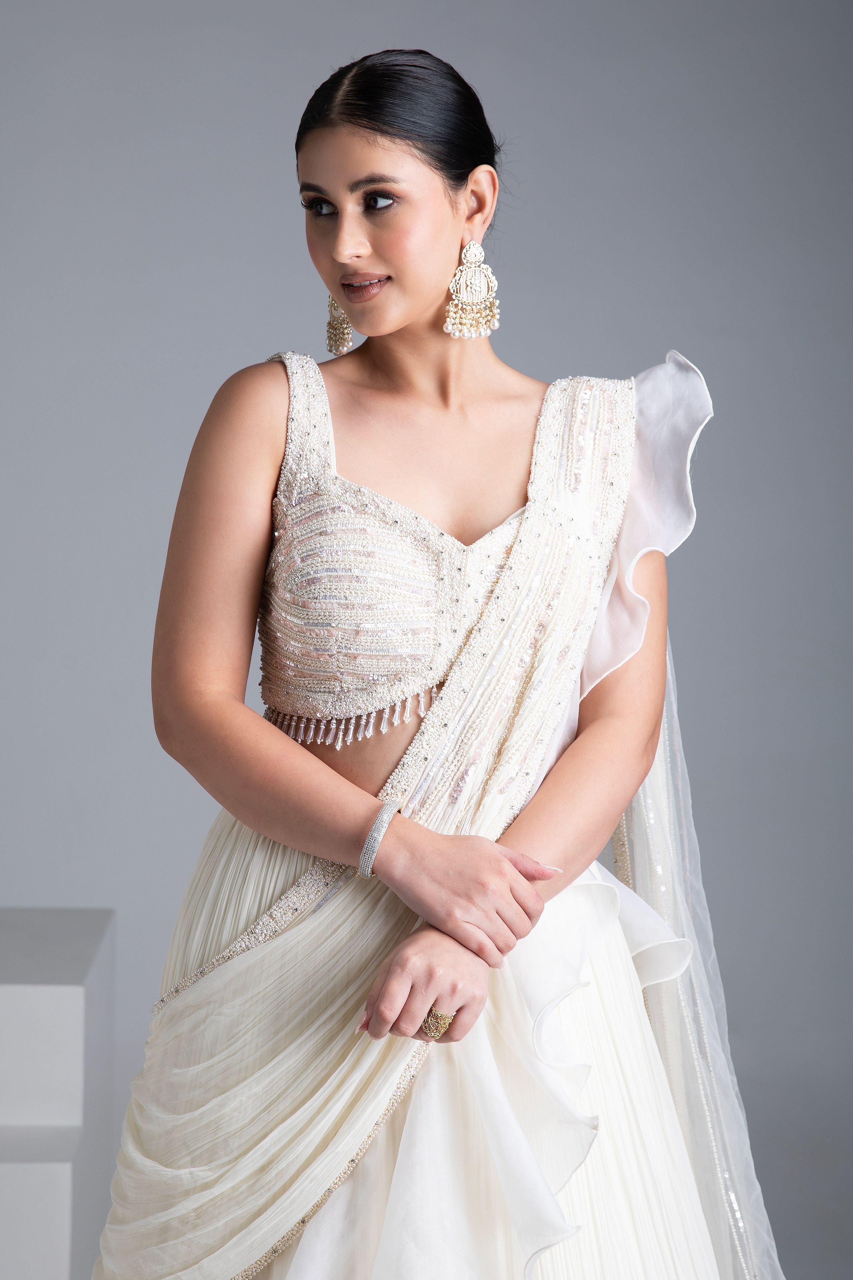 Ivory Georgette Pleated Lehenga Set with Bead and Pearl Embroidered Blouse - Mokshaa