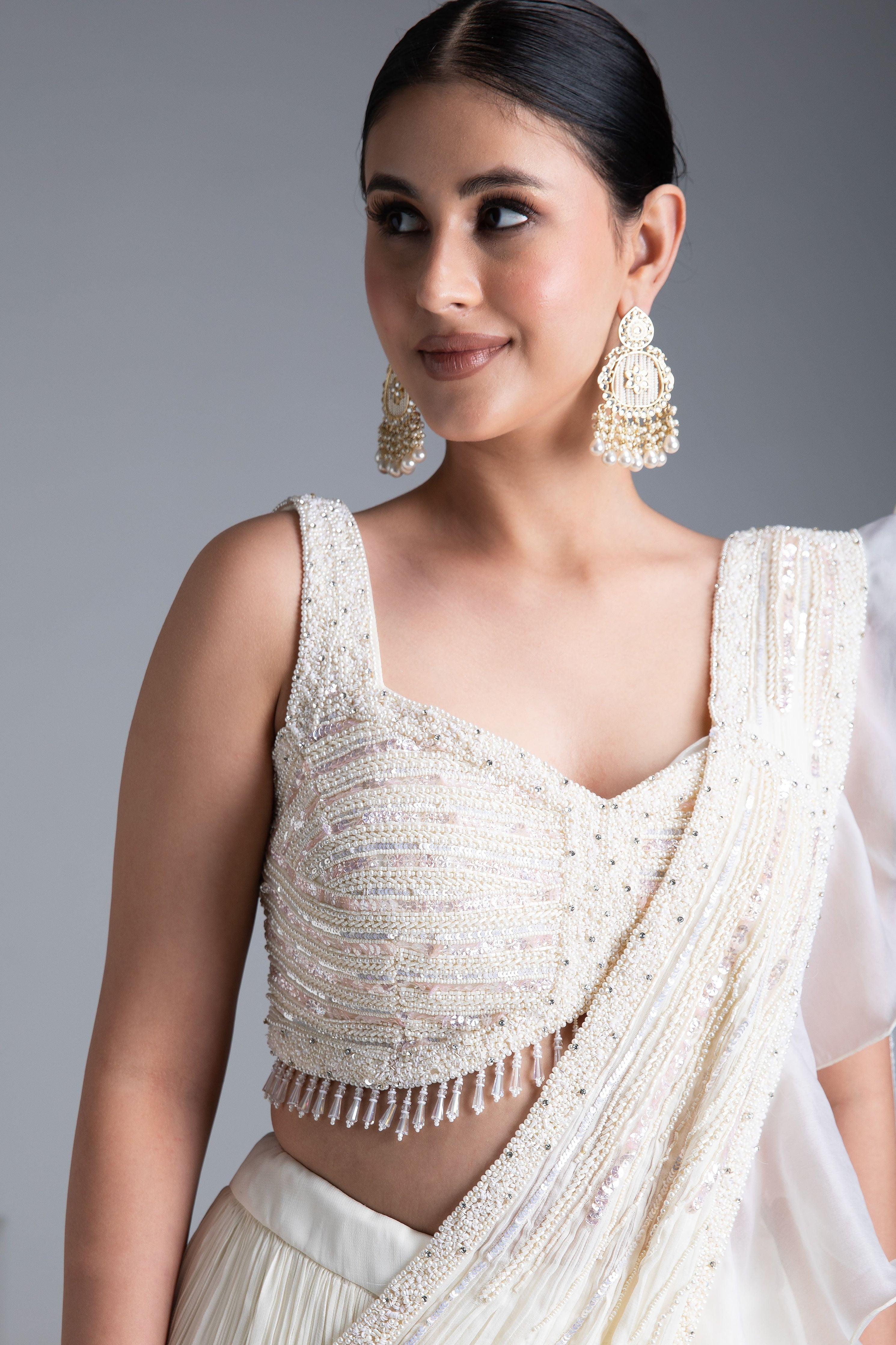 Ivory Georgette Pleated Lehenga Set with Bead and Pearl Embroidered Blouse - Mokshaa