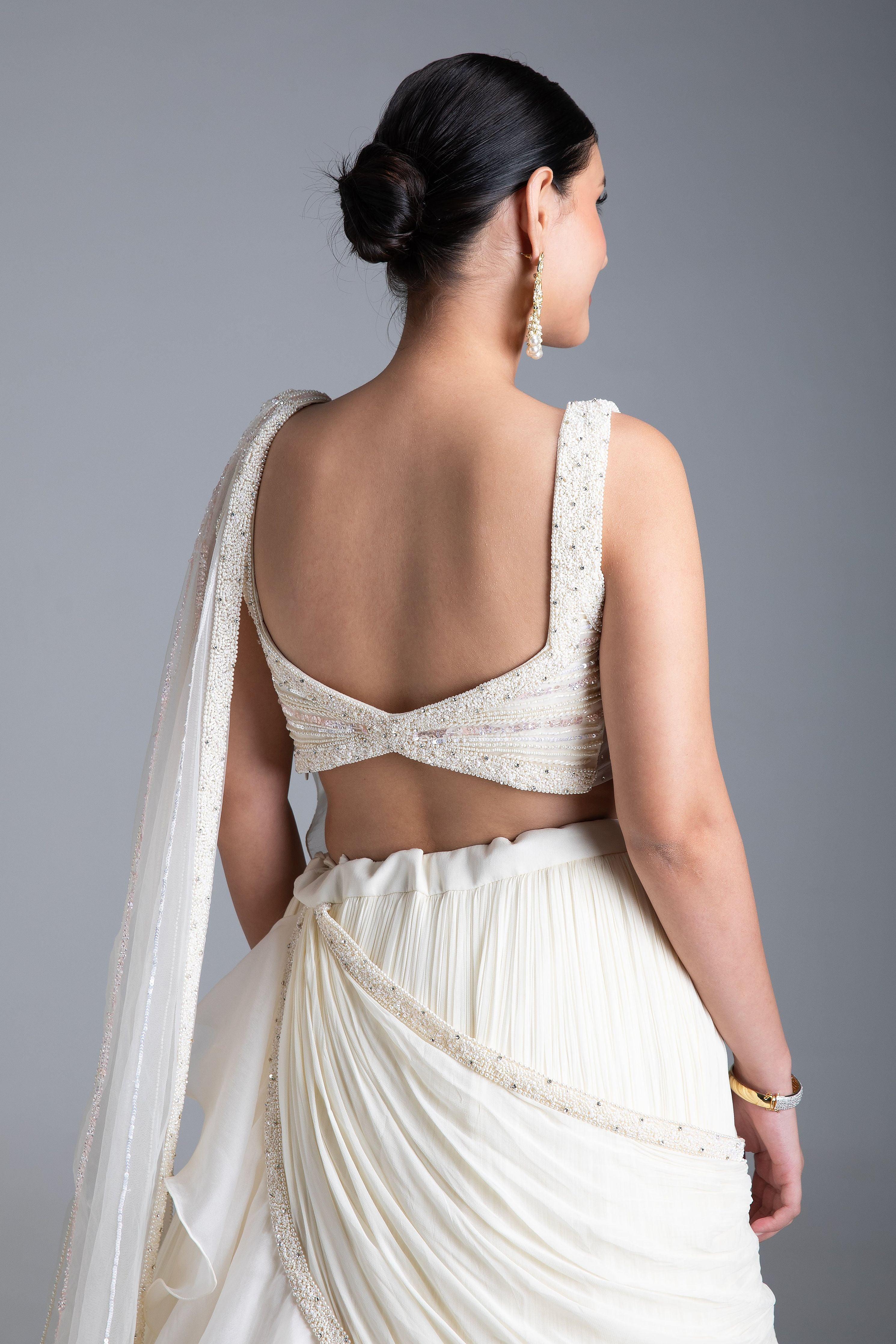 Ivory Georgette Pleated Lehenga Set with Bead and Pearl Embroidered Blouse - Mokshaa
