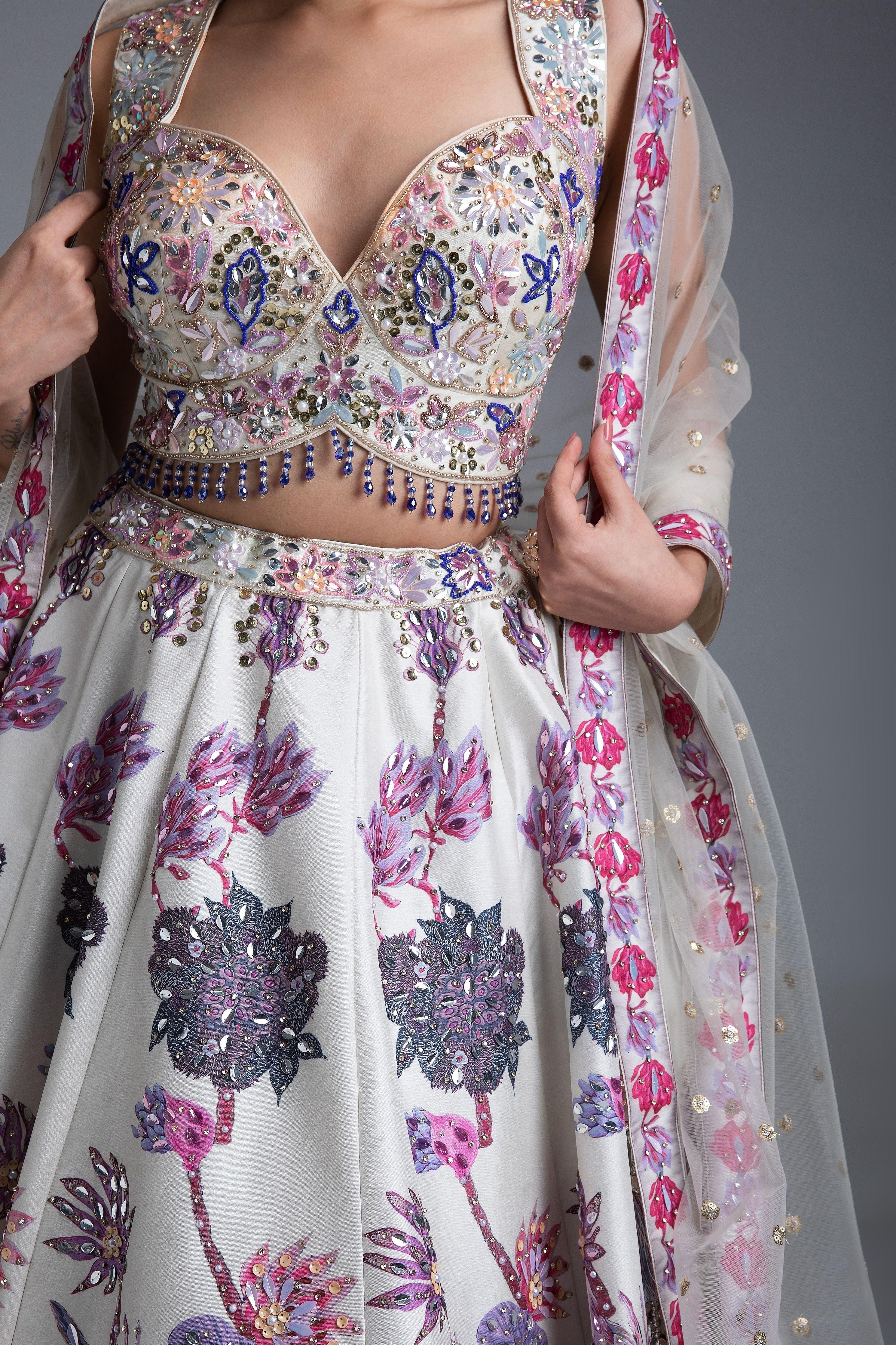 Ivory Silk Lehenga with Multicolor Floral Embroidery and Net Dupatta - Mokshaa