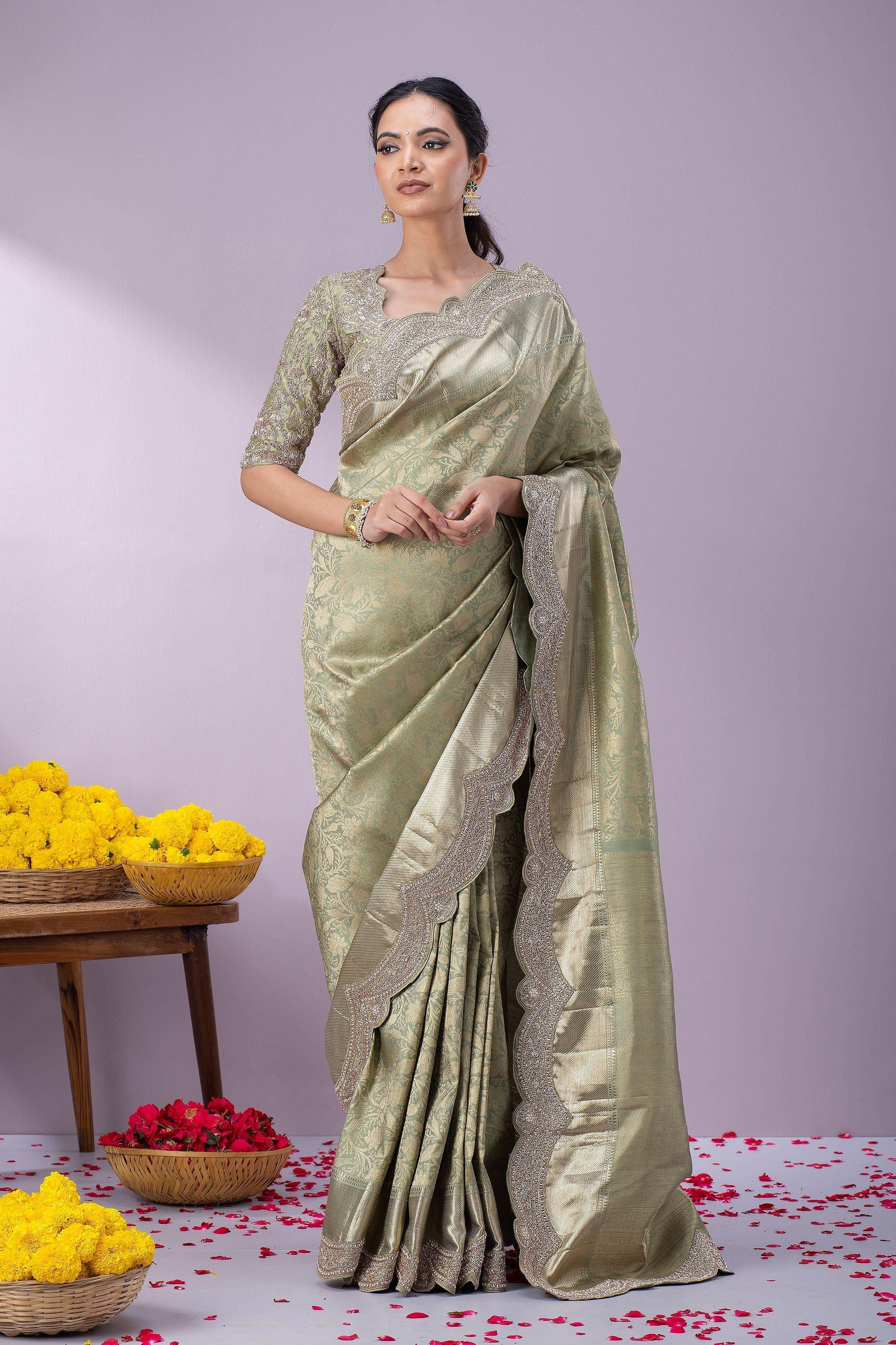 Light Olive Green Kanchipuram Silk Saree with Zari Weaving, Zardosi, and Pearl Work on Scallop Border - Mokshaa