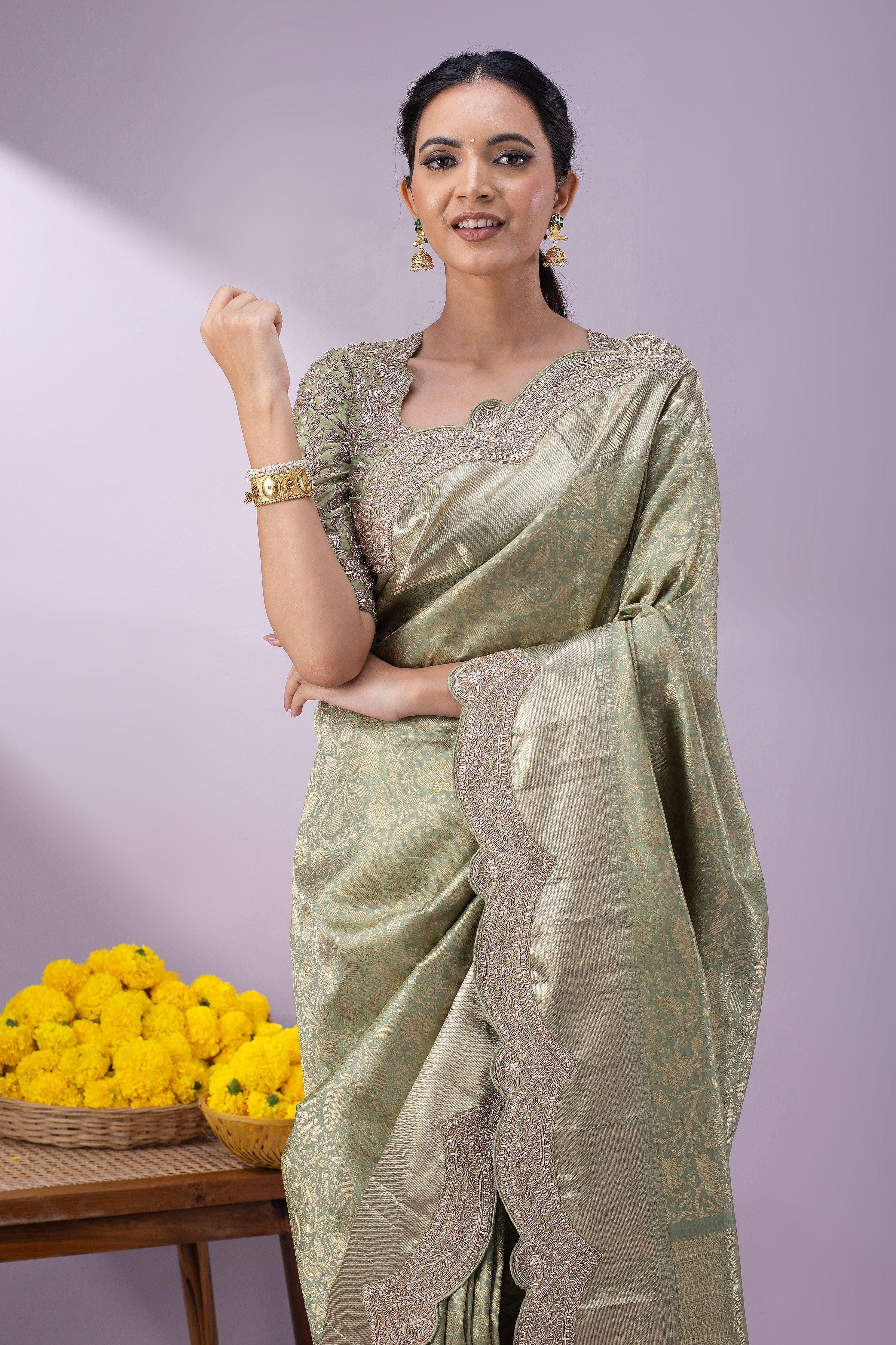 Light Olive Green Kanchipuram Silk Saree with Zari Weaving, Zardosi, and Pearl Work on Scallop Border - Mokshaa
