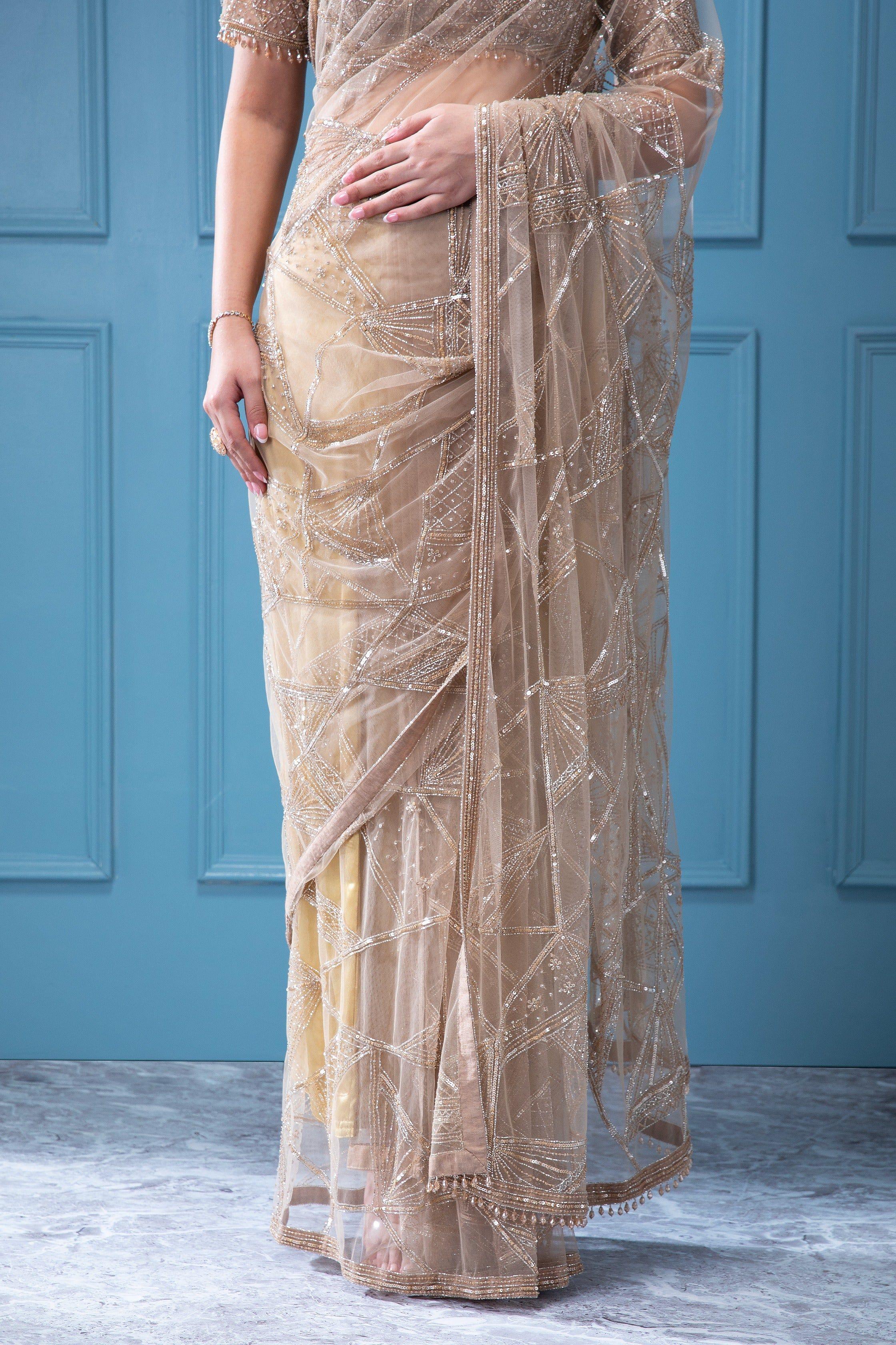 Beige Net Saree with all-over Beads and Sequins Work - Mokshaa