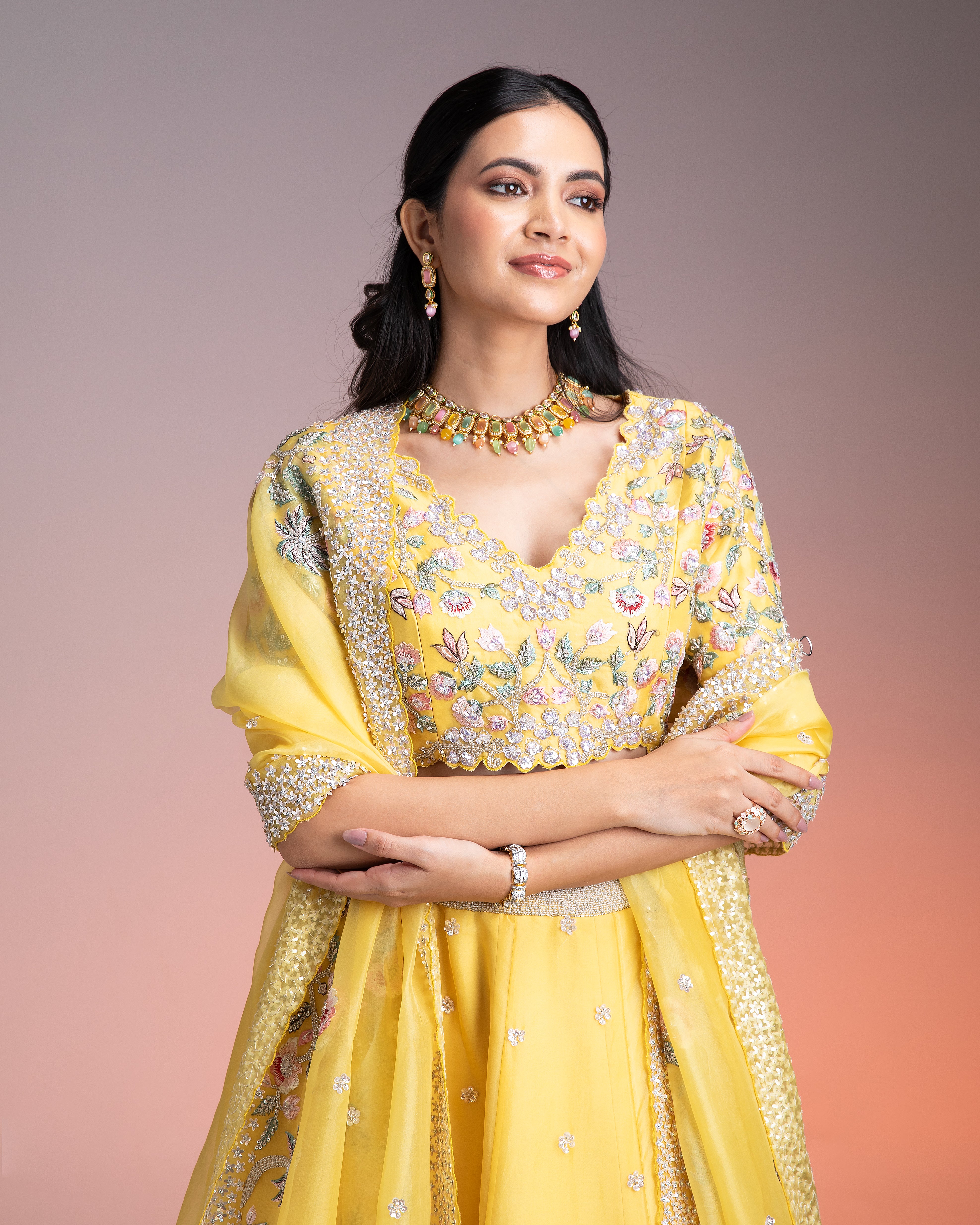 Vibrant Yellow Organza Lehenga with Multicolor Floral Threadwork and Sequins Mokshaa