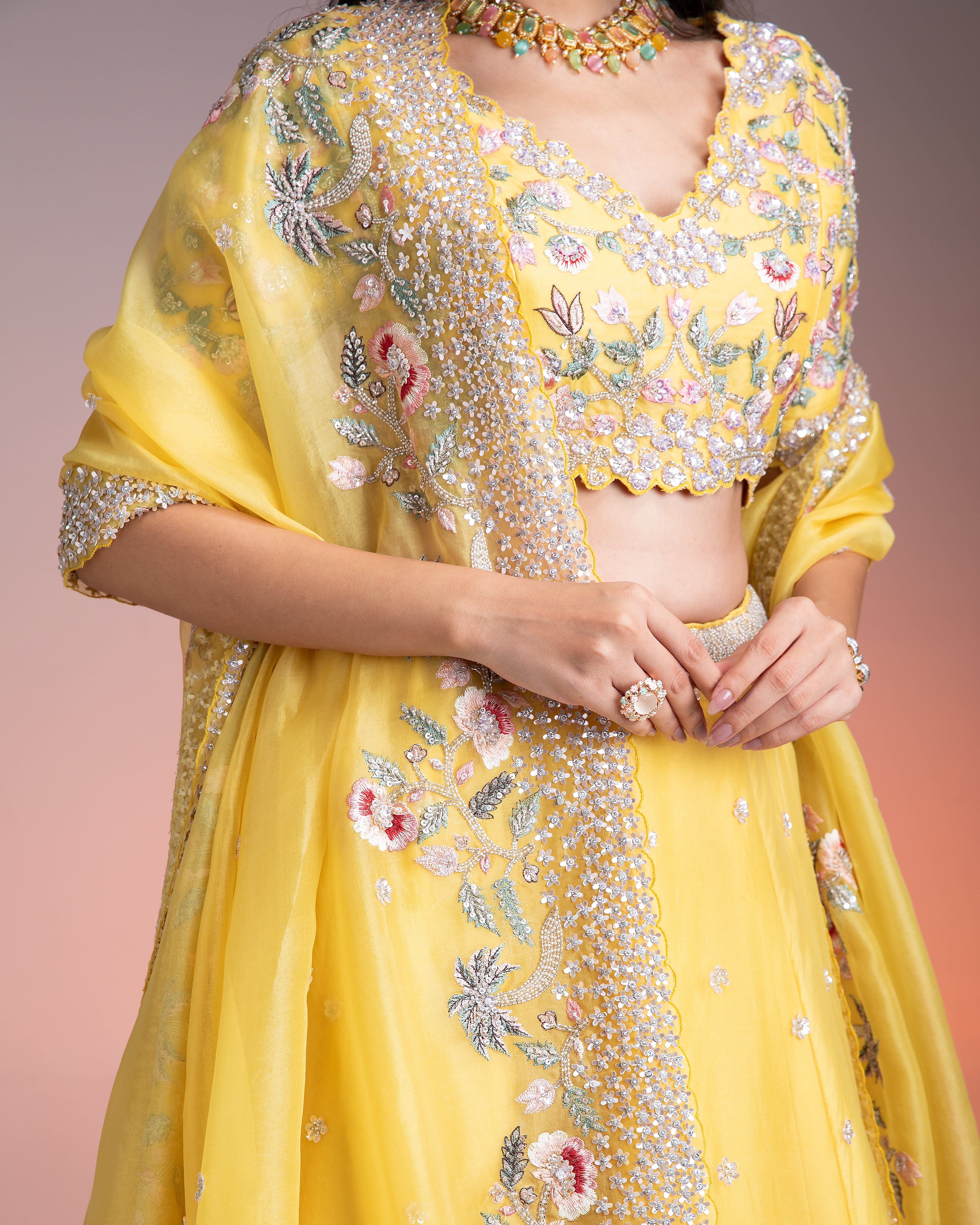 Vibrant Yellow Organza Lehenga with Multicolor Floral Threadwork and Sequins Mokshaa