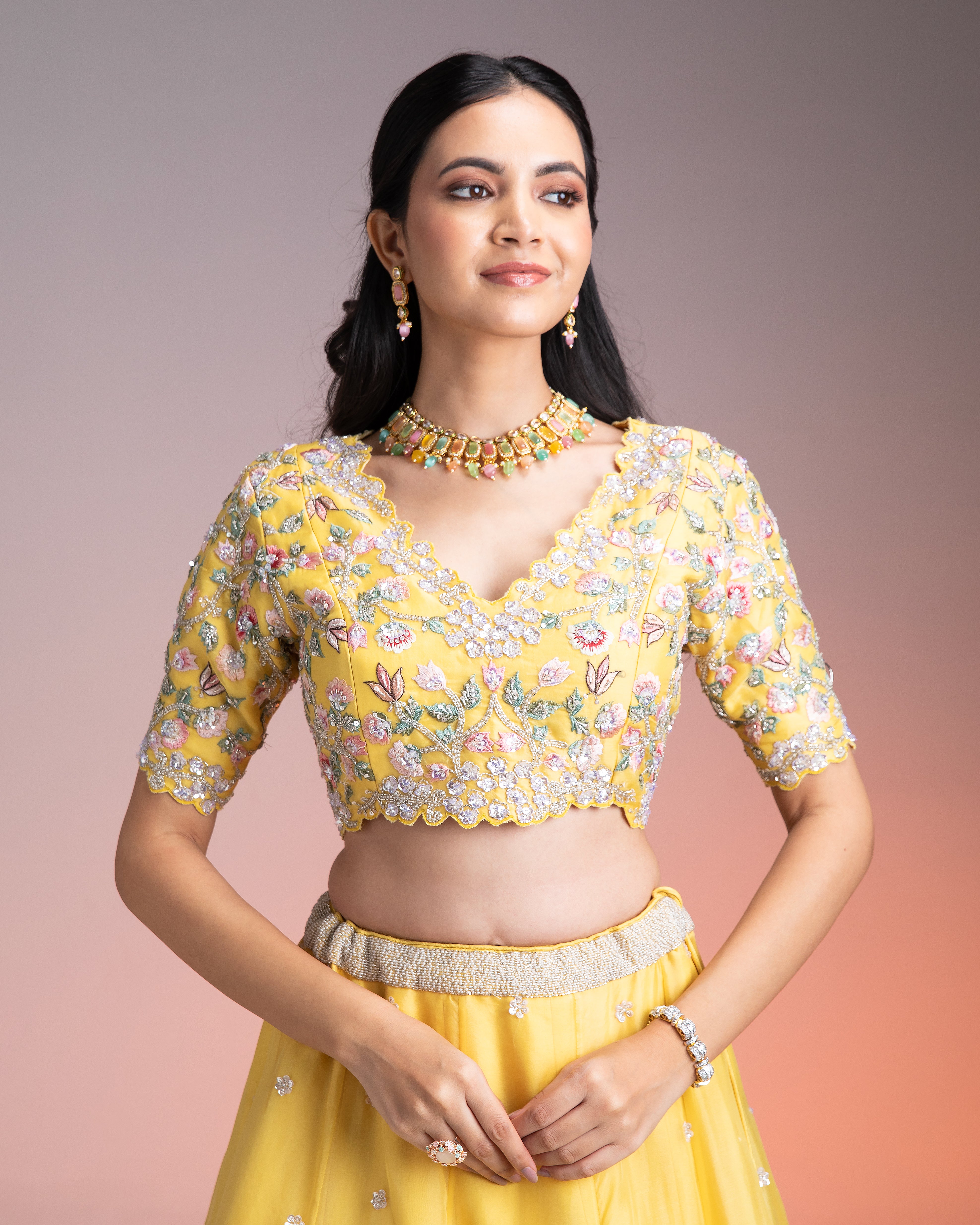 Vibrant Yellow Organza Lehenga with Multicolor Floral Threadwork and Sequins Mokshaa