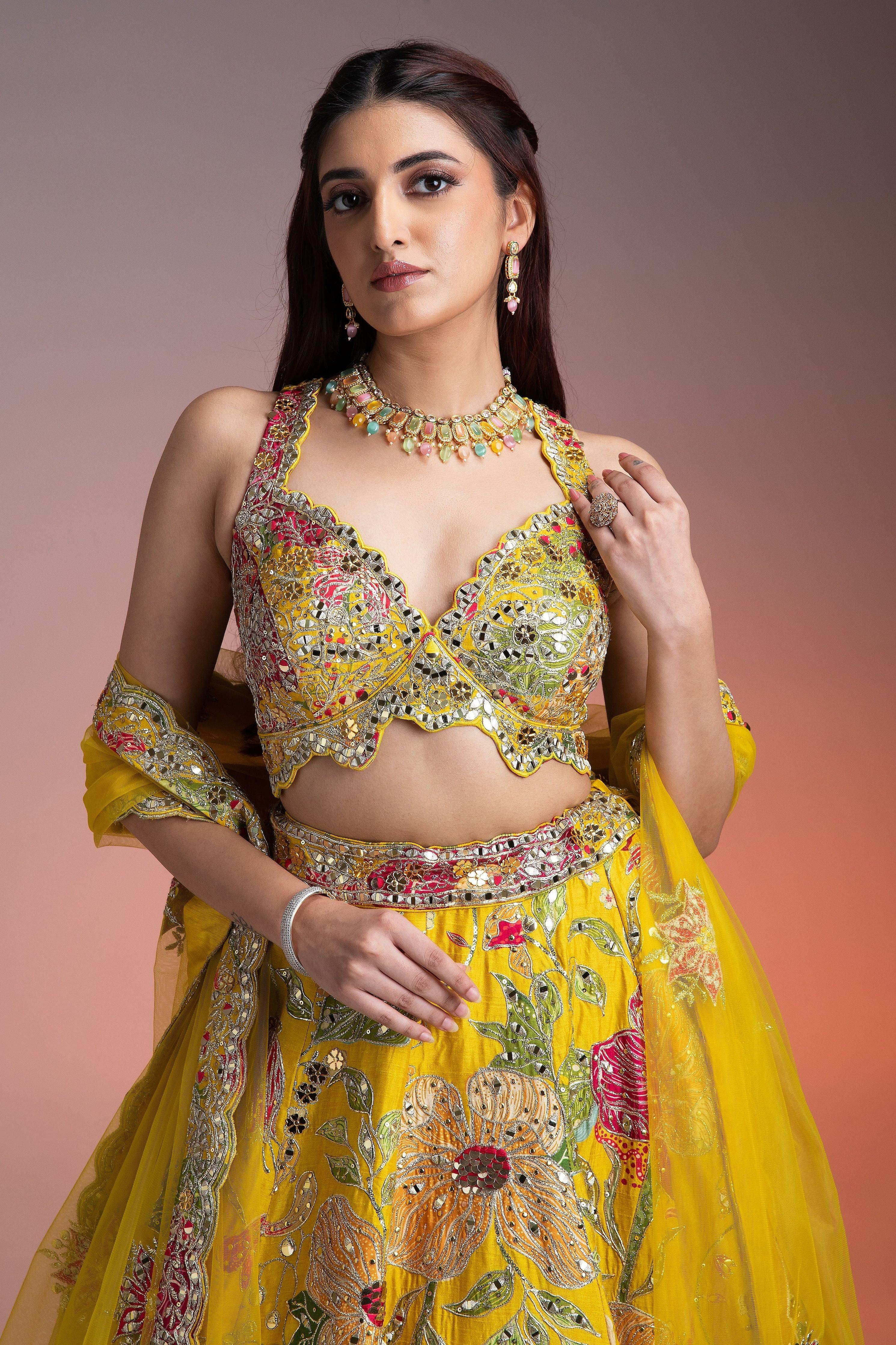 Bright Yellow Silk Lehenga with Multicolor Floral Print and Mirror Embellishments Mokshaa