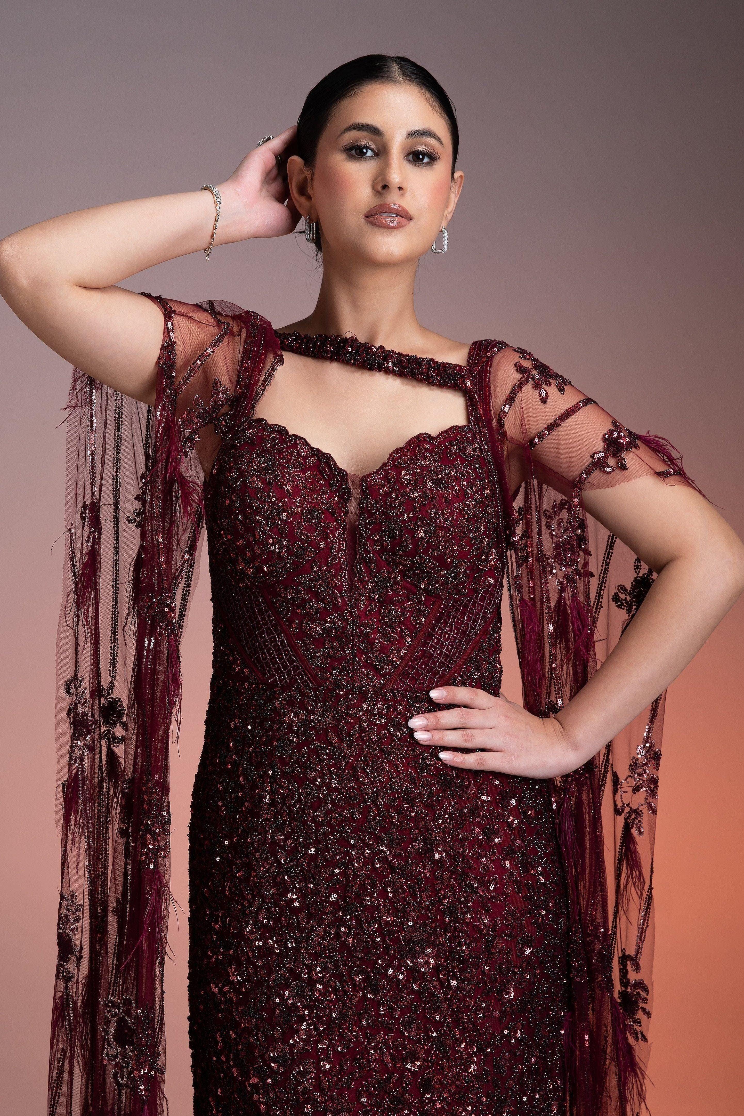 Maroon Sequined Gown with Sheer Cape - Mokshaa
