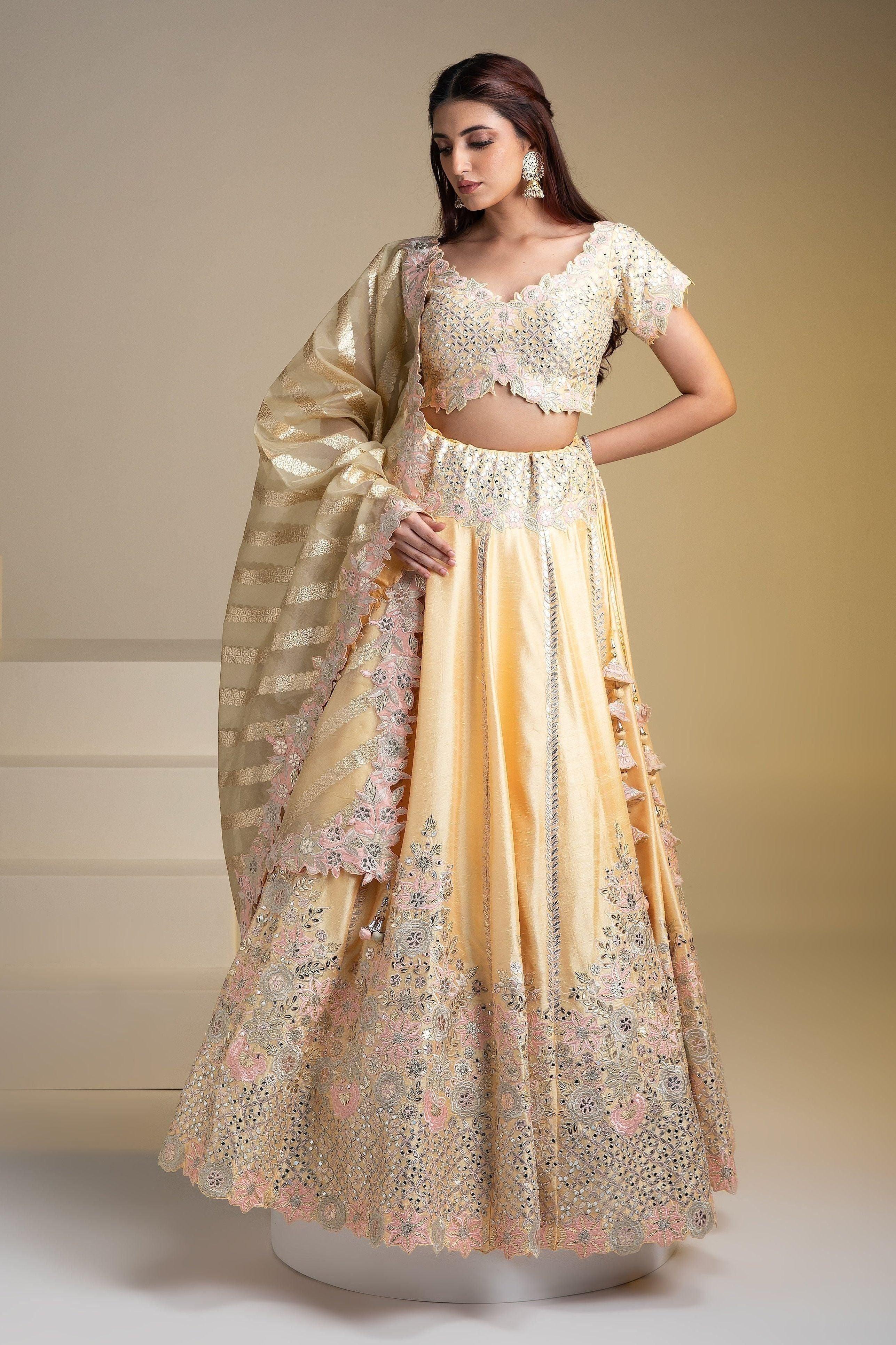 Maize Yellow Silk Lehenga with Pastel Floral Accents and Green Dupatta - Mokshaa