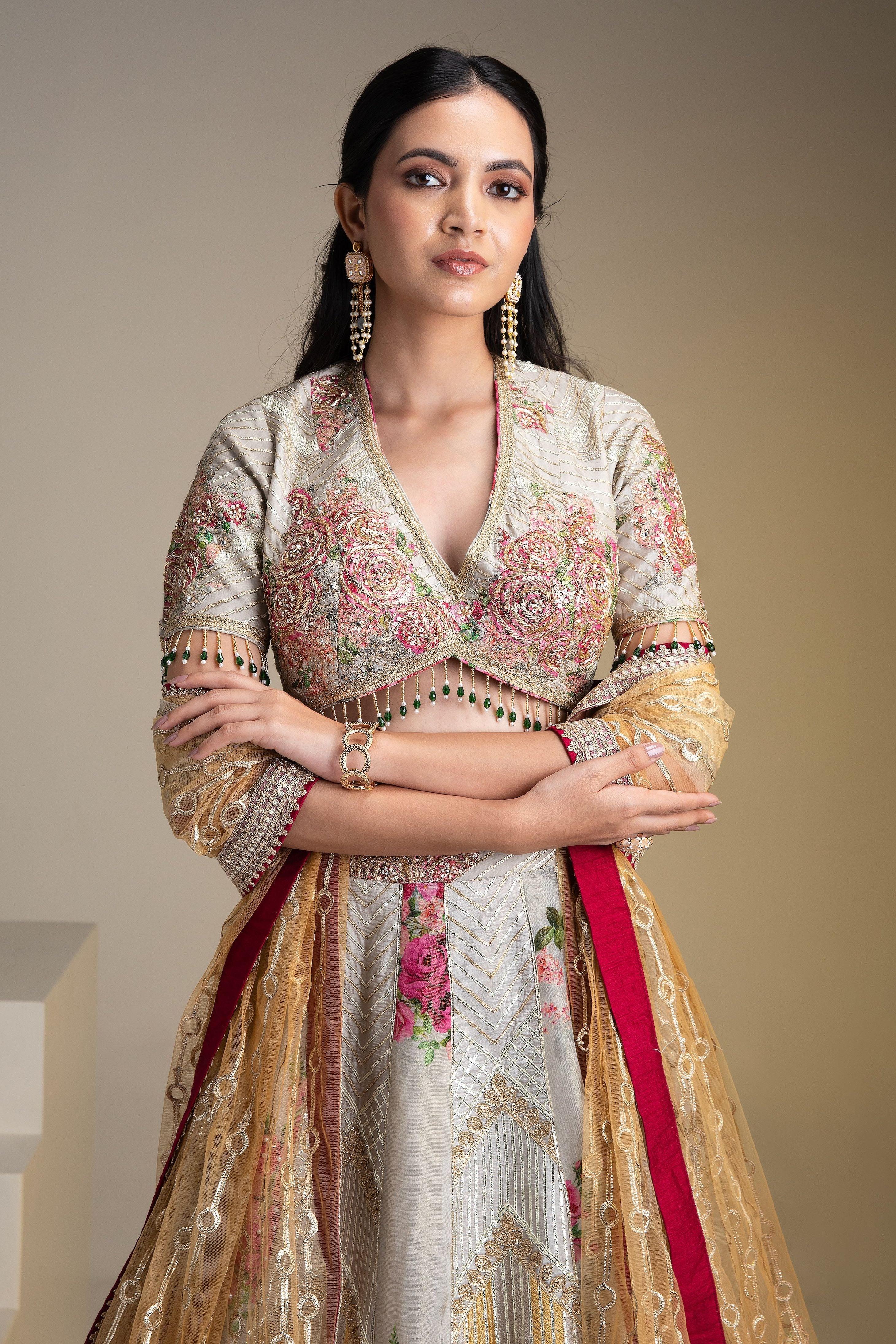 Opulent Silver Tissue Lehenga Set with Vibrant Floral Print and Zari Work - Mokshaa